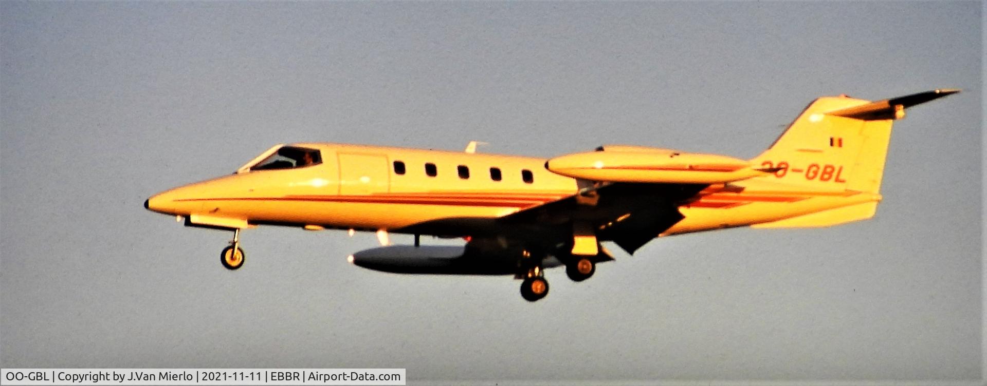 OO-GBL, 1980 Learjet 35A C/N 284, Landing at Brussels by sunset 25R slide scan