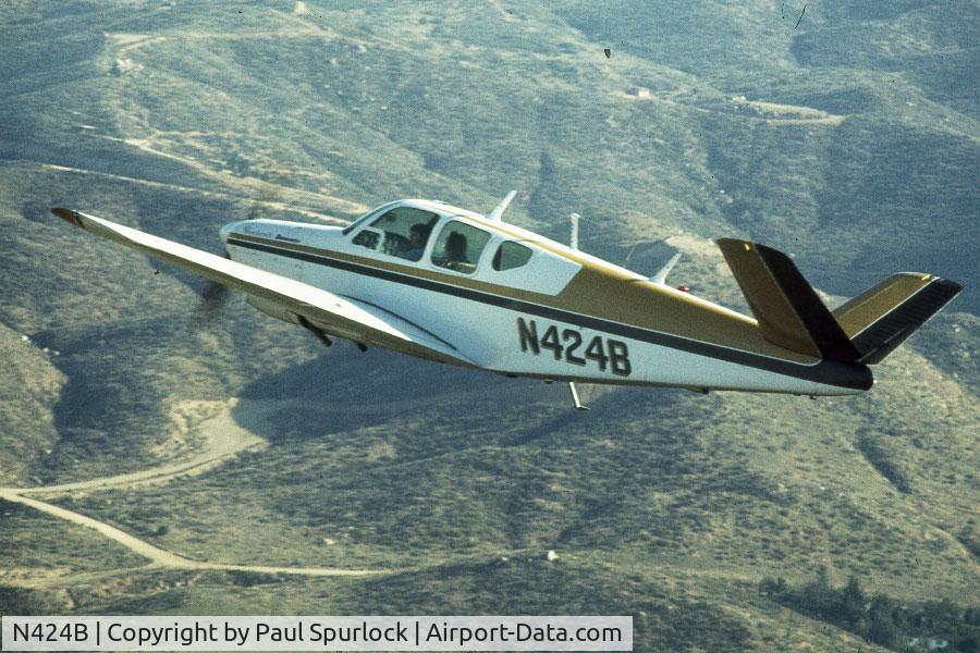 N424B, 1948 Beech A35 Bonanza C/N D-1598, Over southern California in the late 70s.