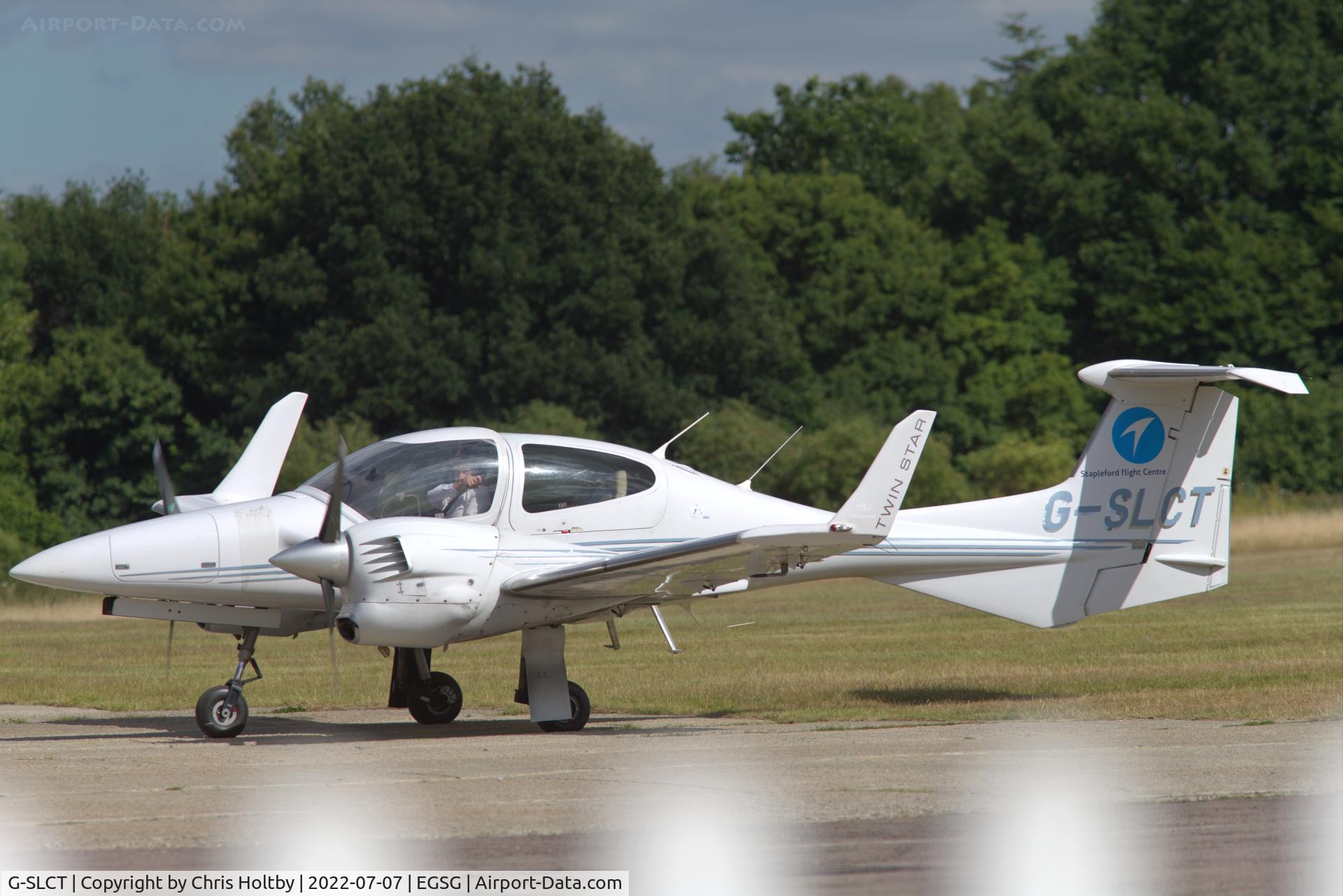 G-SLCT, 2005 Diamond DA-42 Twin Star C/N 42.031, Pre-flight checks at its base at Stapleford Tawney, Essex