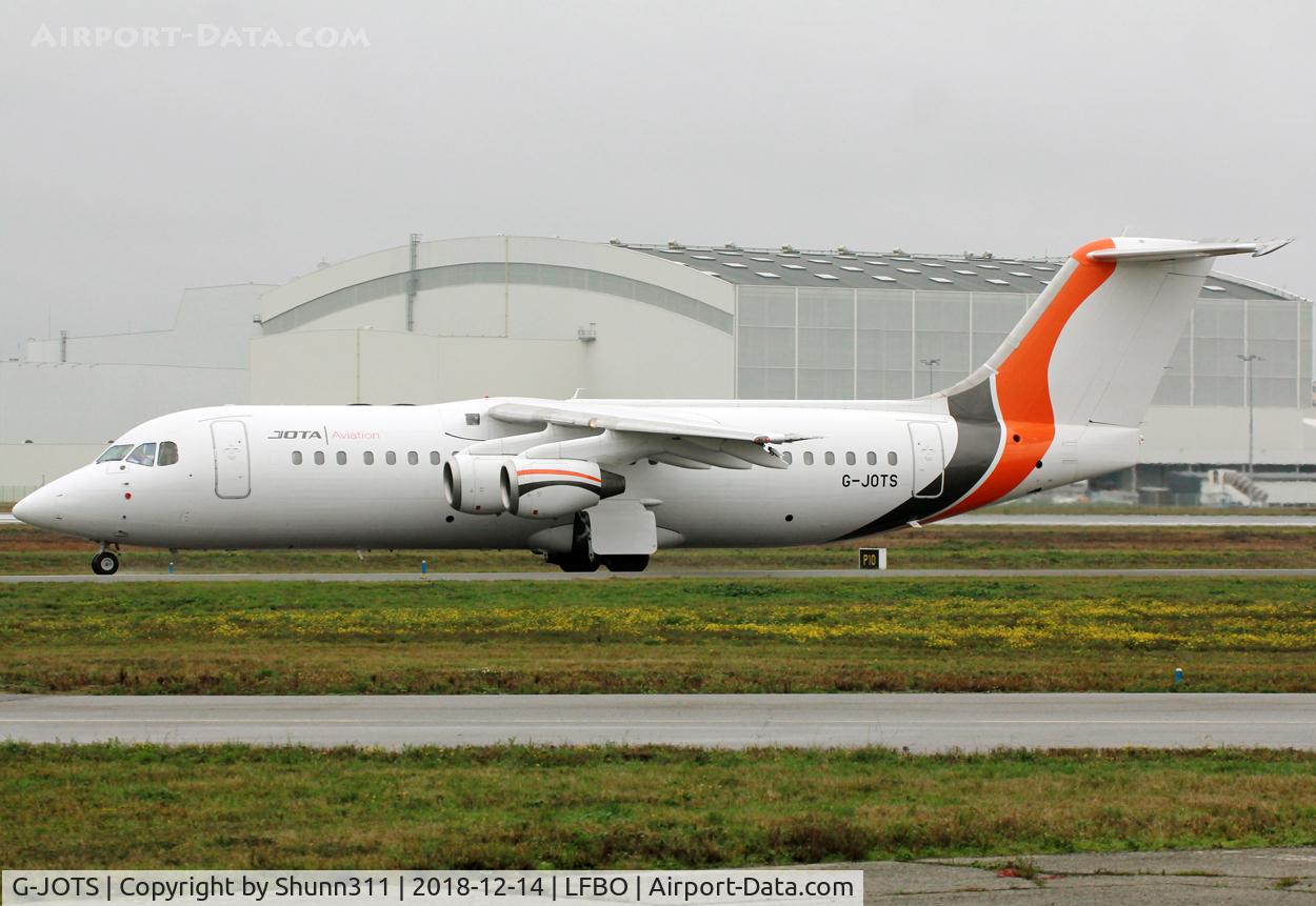G-JOTS, 1999 British Aerospace Avro 146-RJ100 C/N E3355, Taxiing holding point rwy 32R for departure...