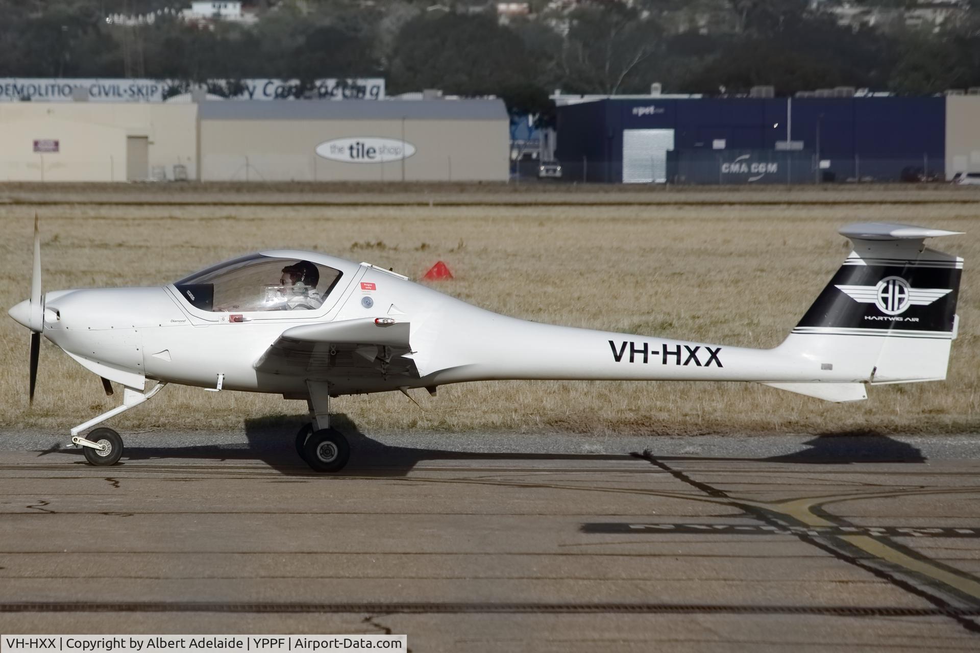 VH-HXX, 1999 Diamond DA-20C-1 Eclipse C/N C0097, VH-HXX Diamond DA-20 Eclipse taxiing along the fence, after doing laps around Parafield airport.