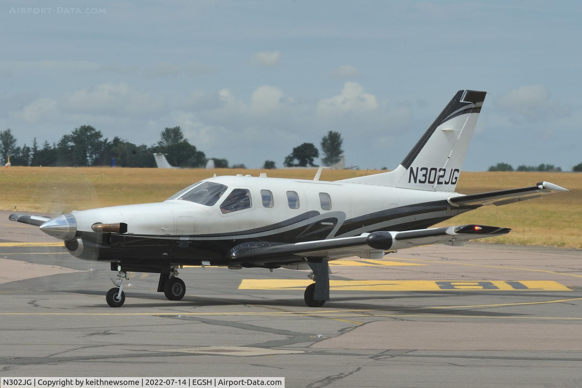 N302JG, 2004 Socata TBM-700 C/N 302, Arriving at Norwich from Guernsey.