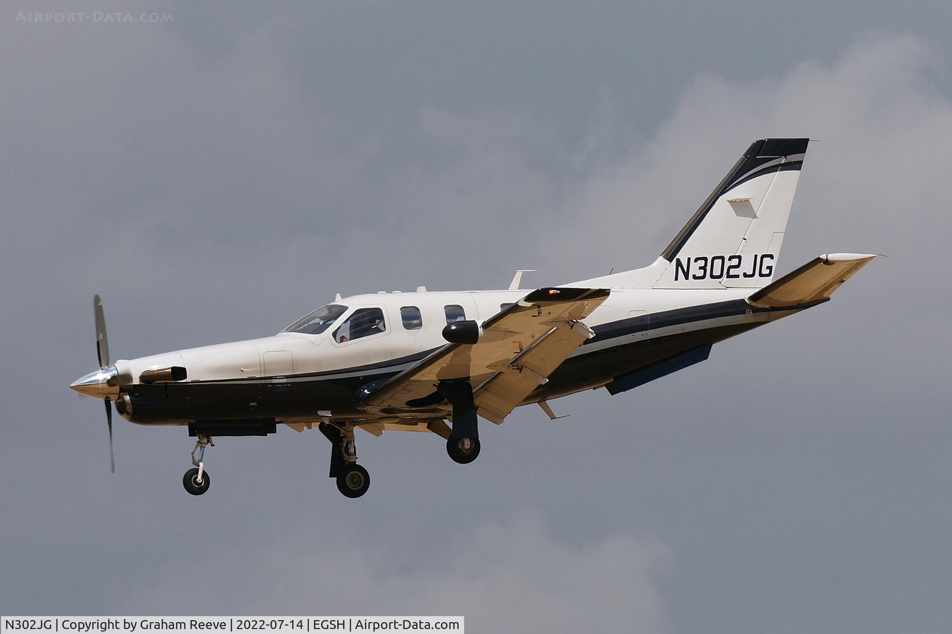 N302JG, 2004 Socata TBM-700 C/N 302, Landing at Norwich.