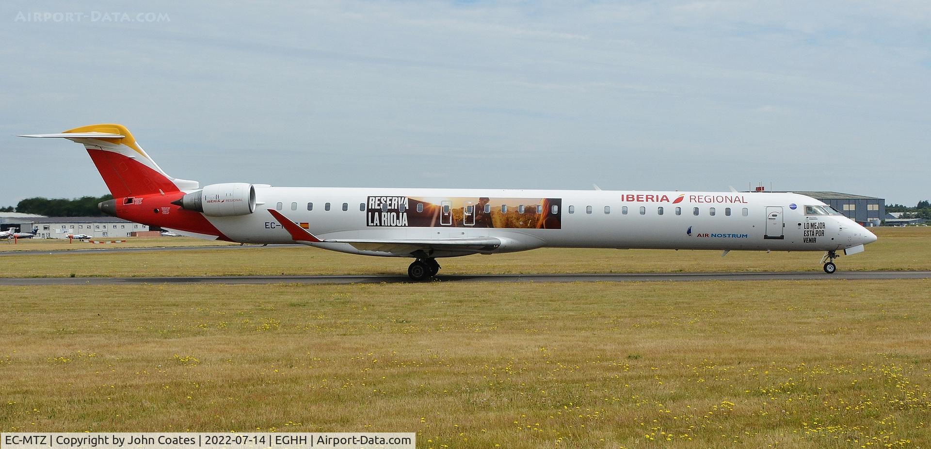 EC-MTZ, 2018 Bombardier CRJ-1000 (CL-600-2E25) C/N 19060, Arriving to take SouthamptonFC to Austria