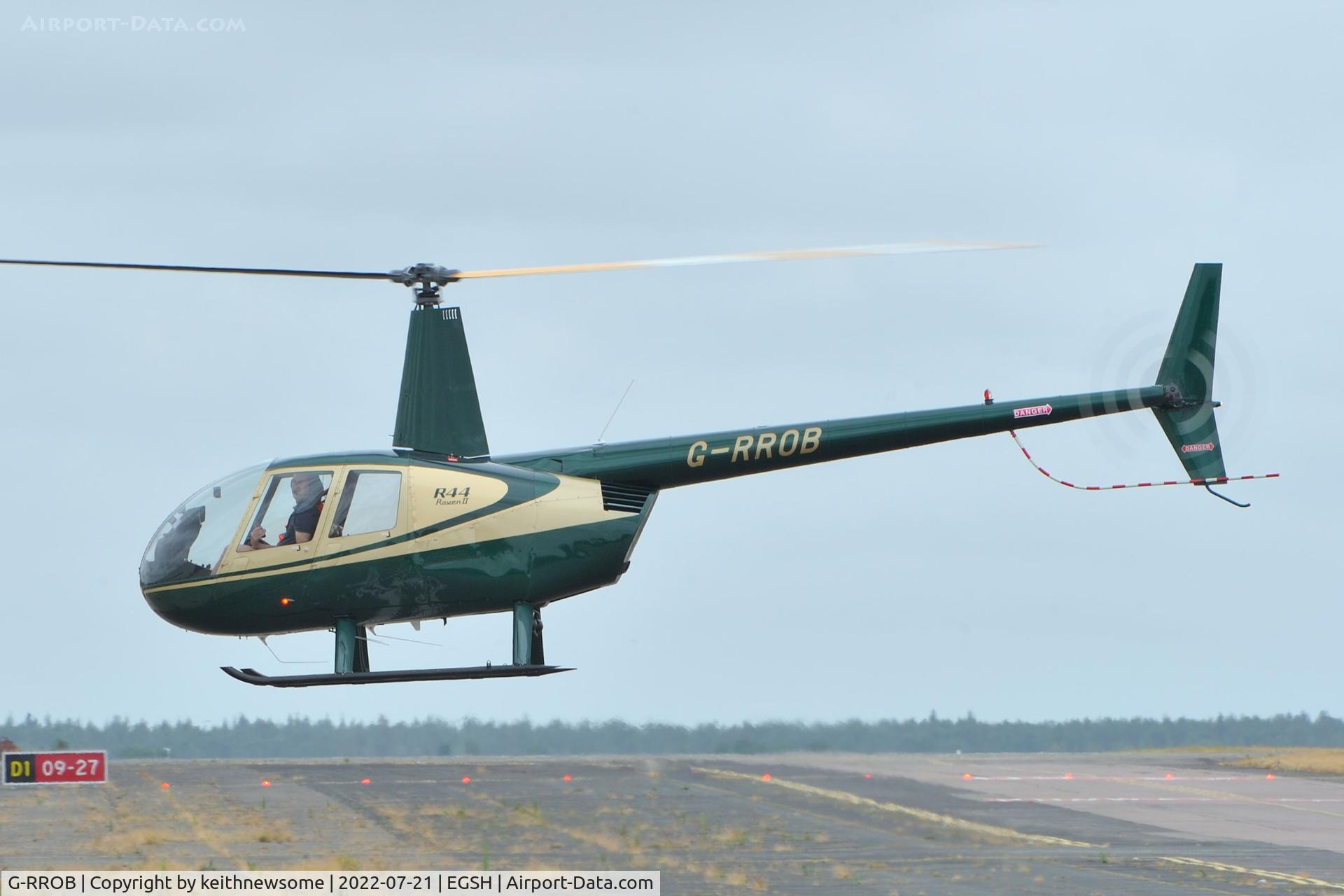 G-RROB, 2002 Robinson R44 II C/N 10011, Arriving at Norwich from Cambridge.