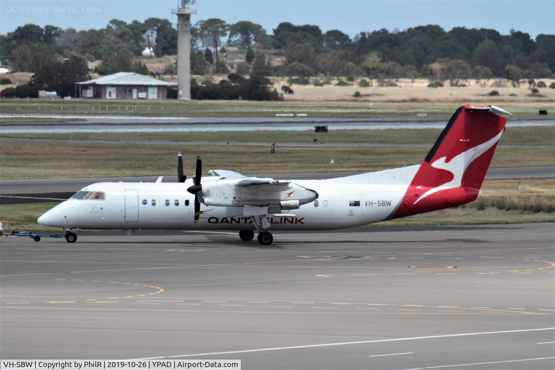VH-SBW, 2004 De Havilland Canada DHC-8-315Q Dash 8 C/N 599, Being towed to the departure ramp Adelaide