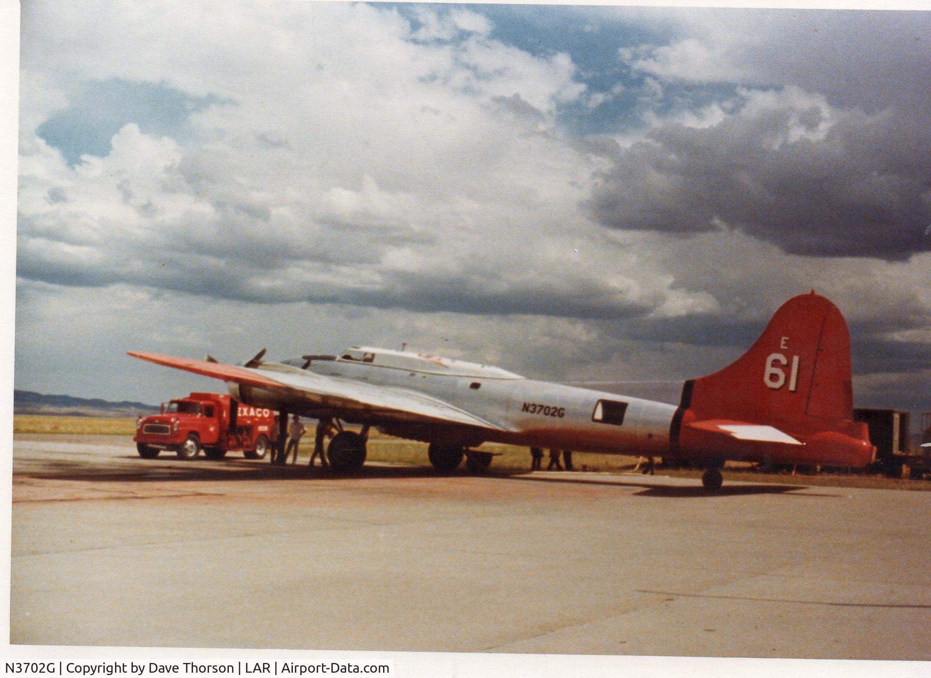 N3702G, 1943 Boeing B-17G Flying Fortress C/N 43-38635, Fighting fires, Laramie WY, summer 1977.
Sister ship N17W and one other B-17 were operating from Laramie at this time. 
I remember how they struggled to clear the airport boundary fence. Field elevation at LAR is 7720!