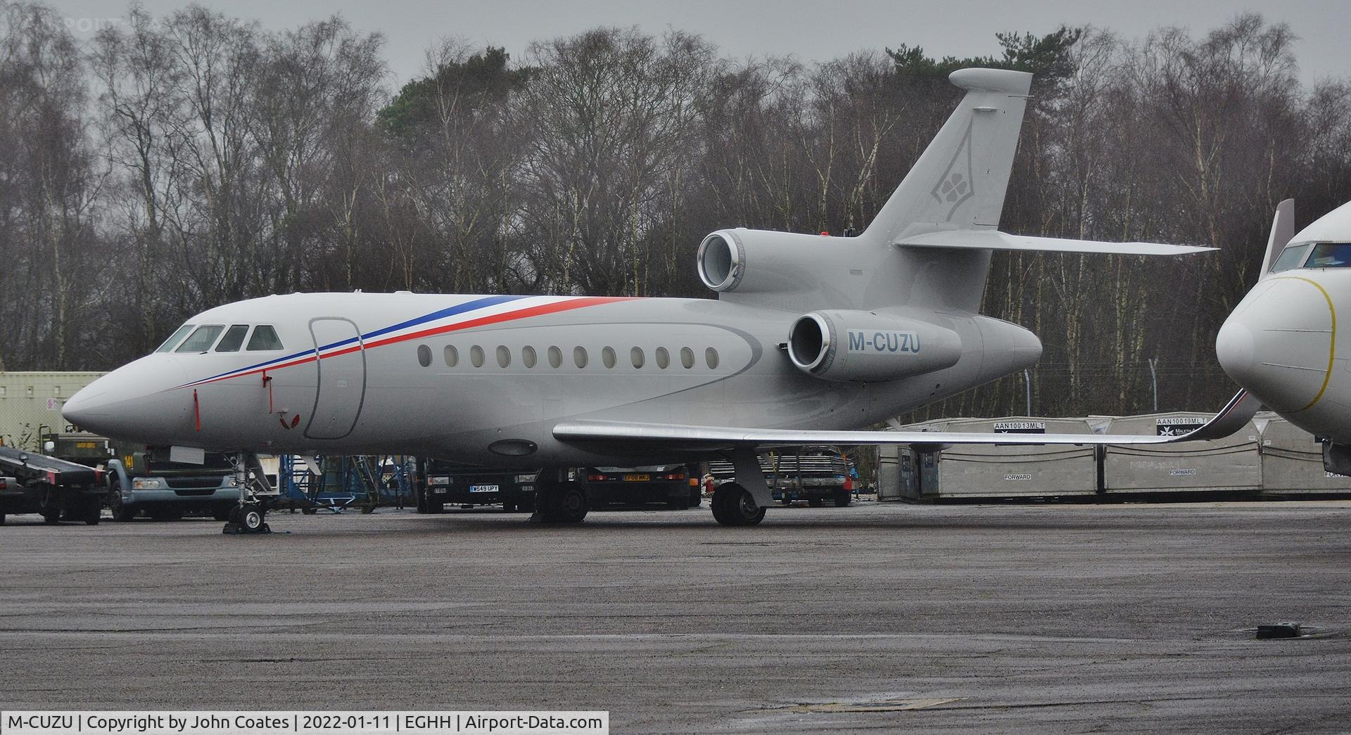M-CUZU, 2001 Dassault Falcon 900EX C/N 95, Parked at Thurston Aviation