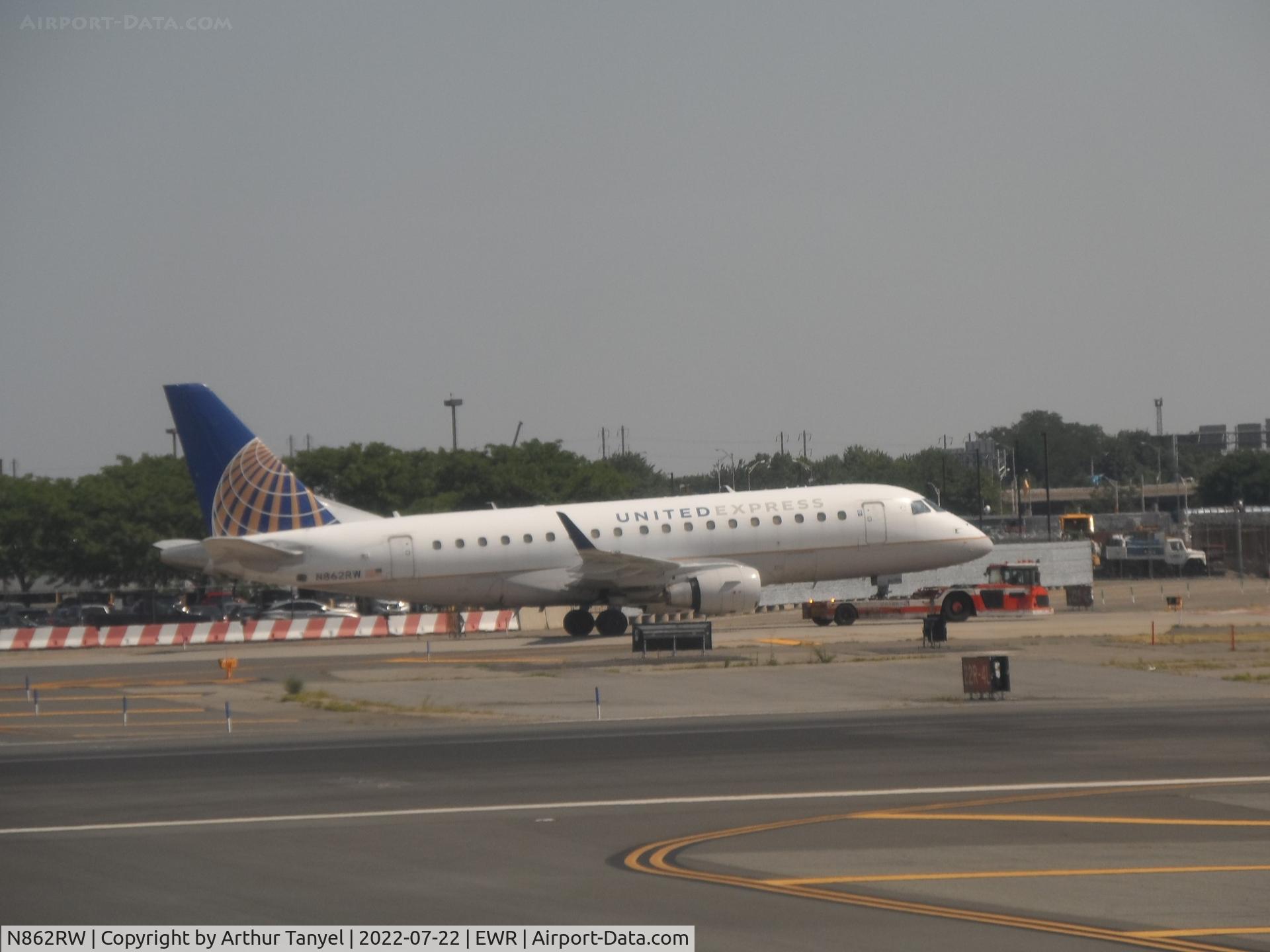 N862RW, 2005 Embraer 170SE (ERJ-170-100SE) C/N 17000098, Being towed @ EWR