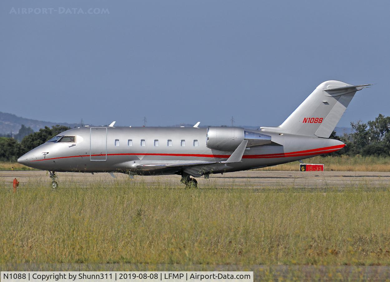 N1088, 2009 Bombardier Challenger 605 (CL-600-2B16) C/N 5798, Parked at the General Aviation area...