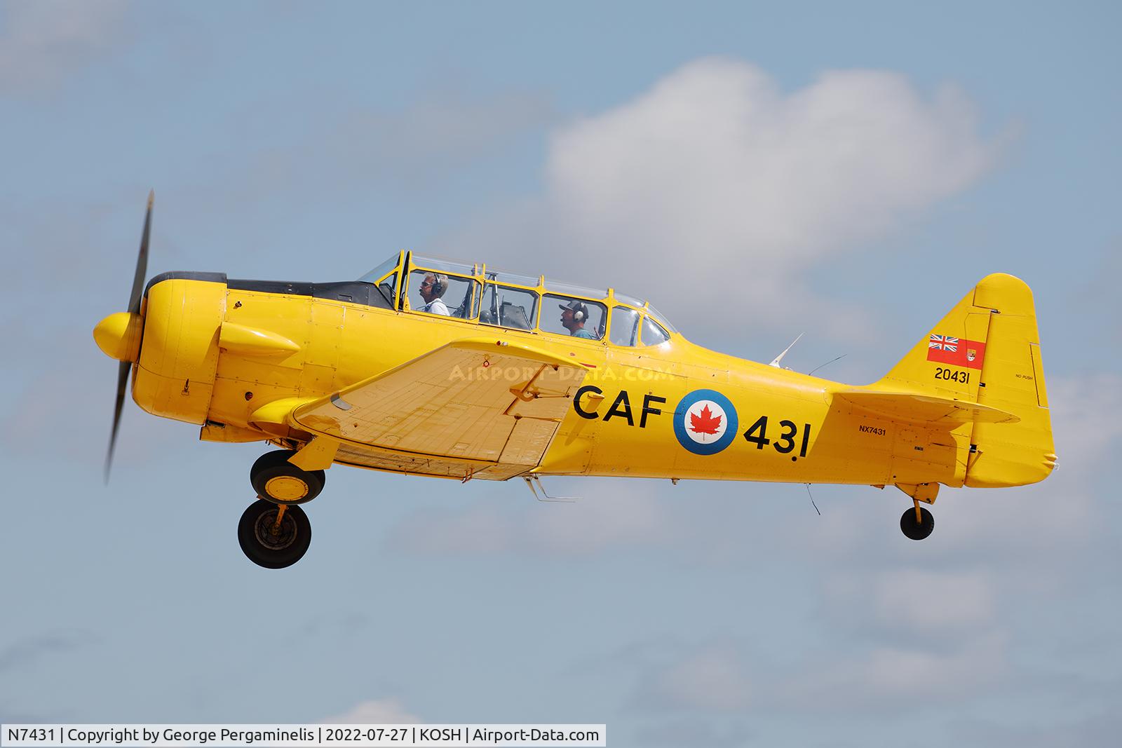 N7431, 1952 Canadian Car & Foundry Harvard MK IV C/N CCF4 222, Departing runway 27.