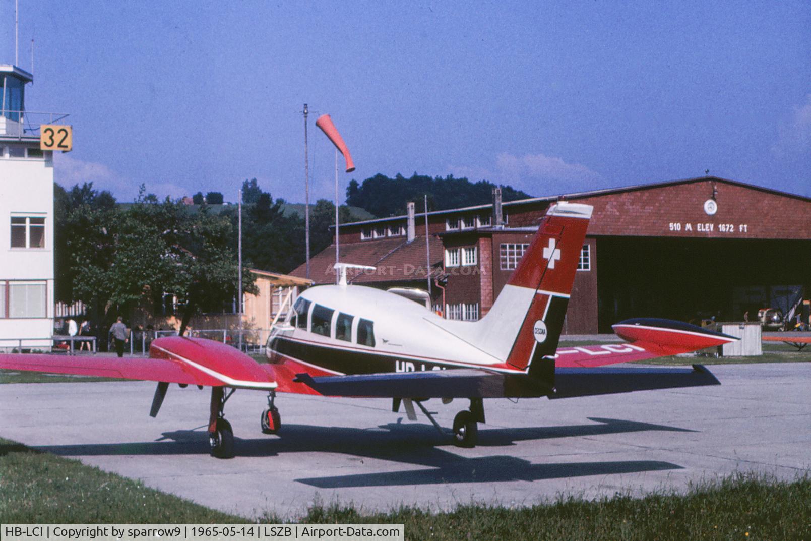 HB-LCI, 1964 Cessna 320B Skyknight C/N 320B0047, At Berne-Belp, many years ago. Scanned from a slide.