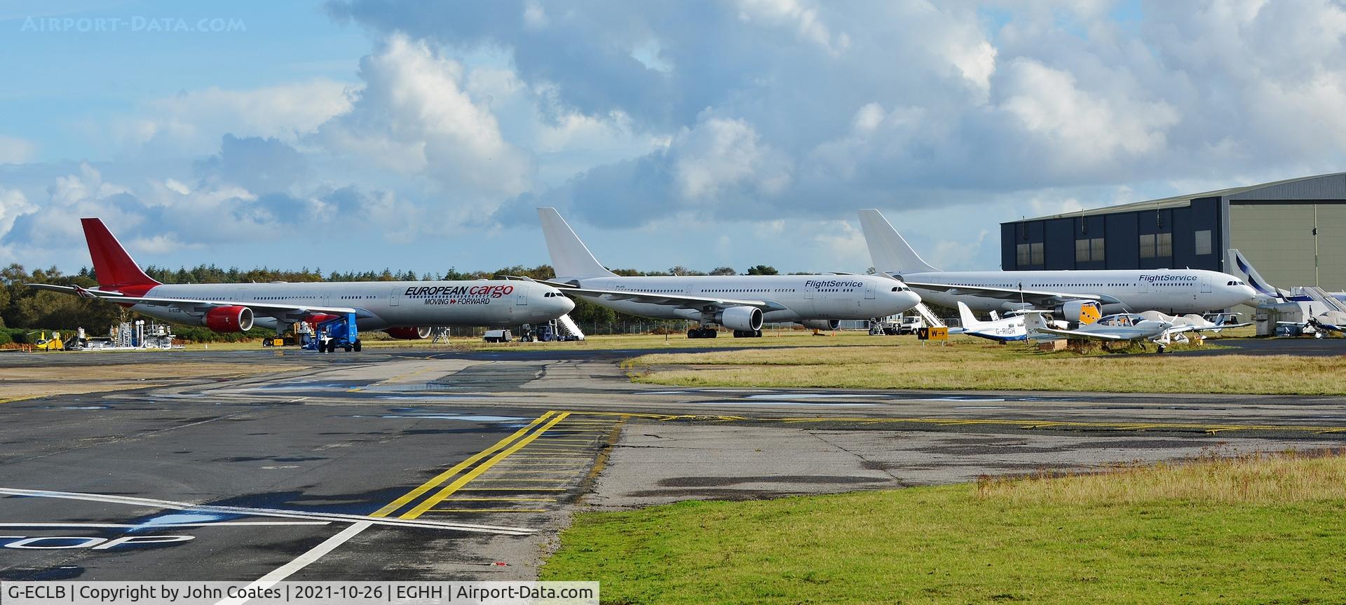 G-ECLB, 2006 Airbus A340-642 C/N 753, At Cargo parking with 9H-JFS and 9H-LFS