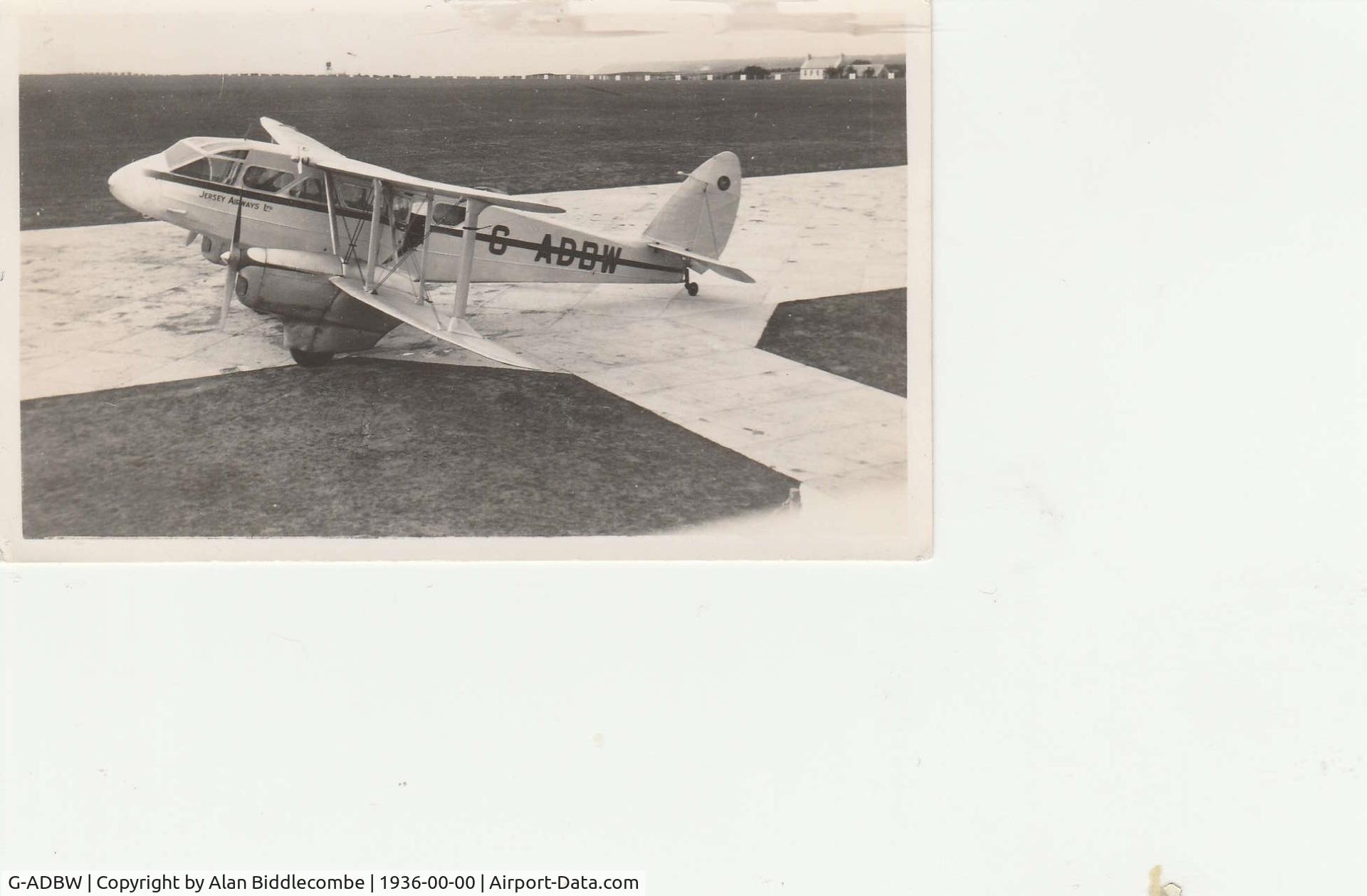 G-ADBW, De Havilland DH-89A Dragon Rapide C/N 6288, Picture taken from an old family album with the inscription 'Jersey Airport 1936' on reverse.  
The original is in my possession, and has not been copied to any other website.
