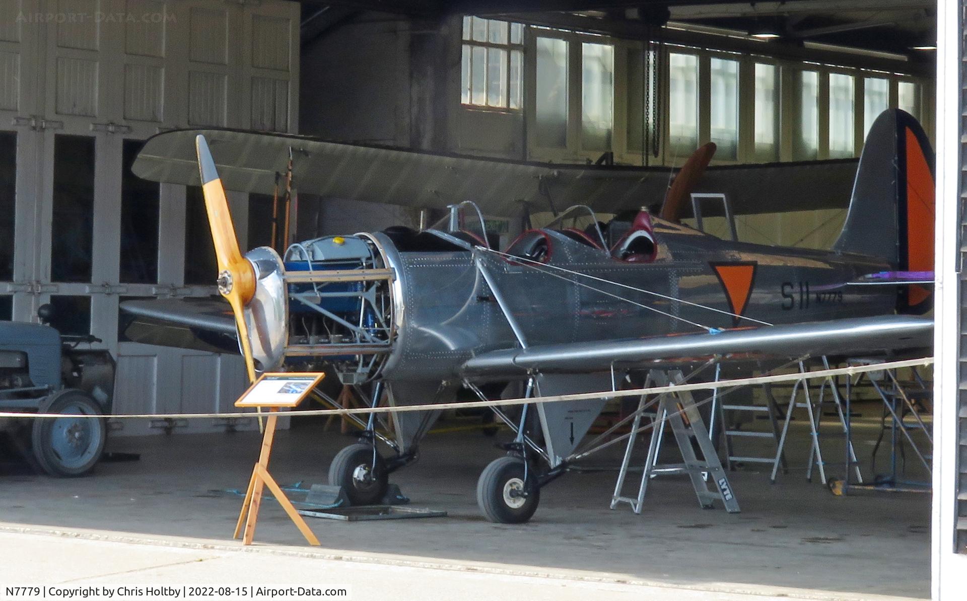 N7779, 1940 Ryan Aeronautical ST-A C/N 476, The Ryan ST-M 'Recruit' WWII trainer on show in the engineering hangar at Old Warden, Beds.
