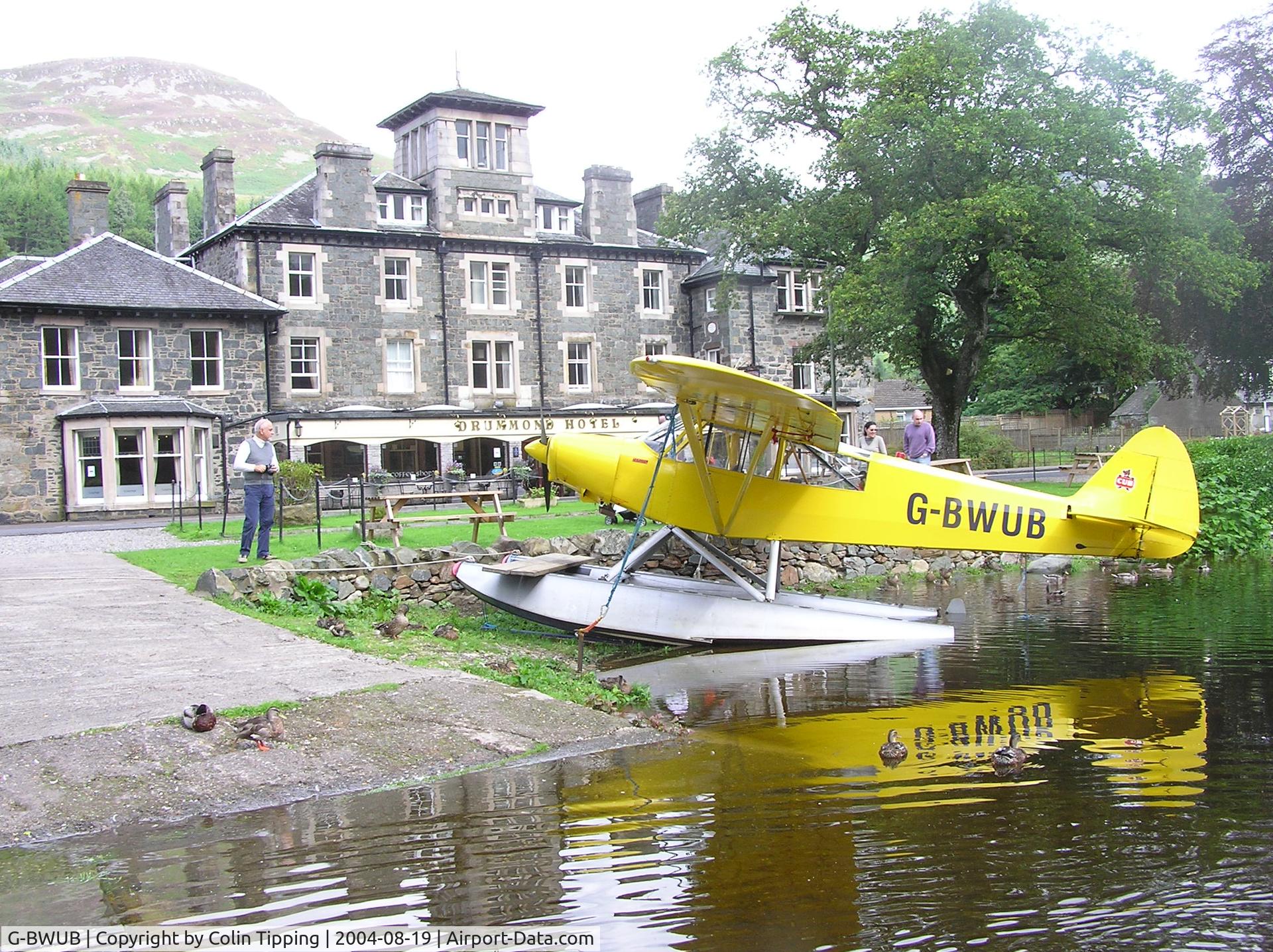 G-BWUB, 1954 Piper L-21B Super Cub C/N 18-3986, Parked on Loch Earn in St Fillans, Perthshire. Photo taken on 19-Aug-2004 on my 60th birthday. Plane believed at the time to be used for pleasure flights to, amongst other places, the West coast of Scotland.