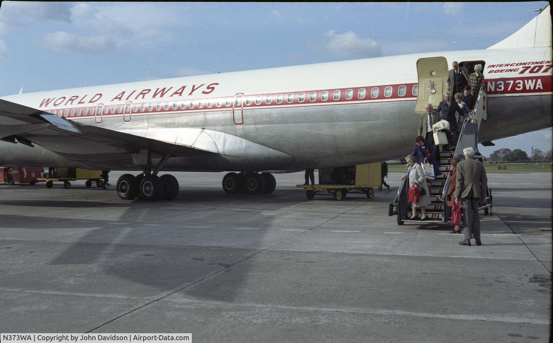 N373WA, 1963 Boeing 707-373C C/N 18582, Passengers disembarking, circa 1970