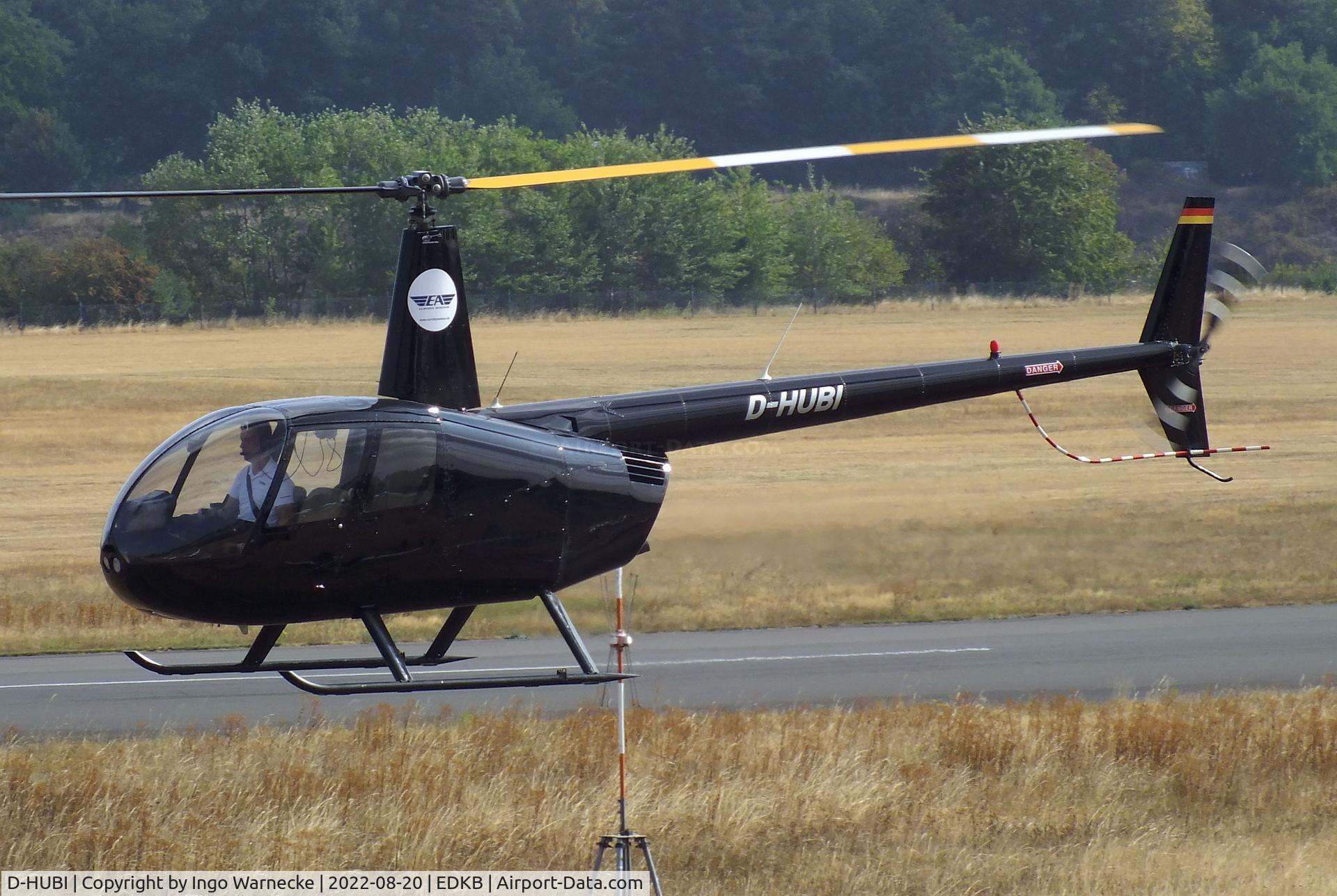 D-HUBI, 2000 Robinson R44 Astro C/N 0725, Robinson R44 Astro of EA Eurofly Aviation at Bonn-Hangelar airfield during the Grumman Fly-in 2022