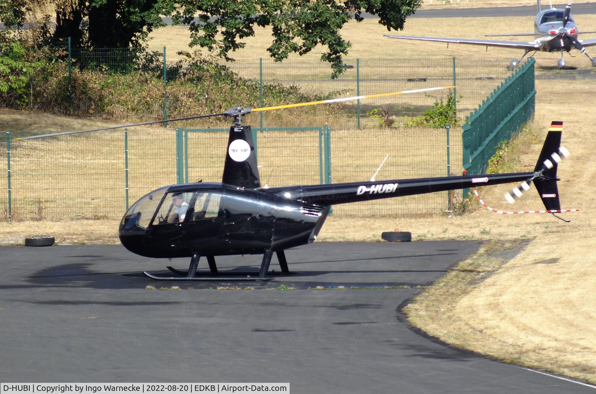 D-HUBI, 2000 Robinson R44 Astro C/N 0725, Robinson R44 Astro of EA Eurofly Aviation at Bonn-Hangelar airfield during the Grumman Fly-in 2022