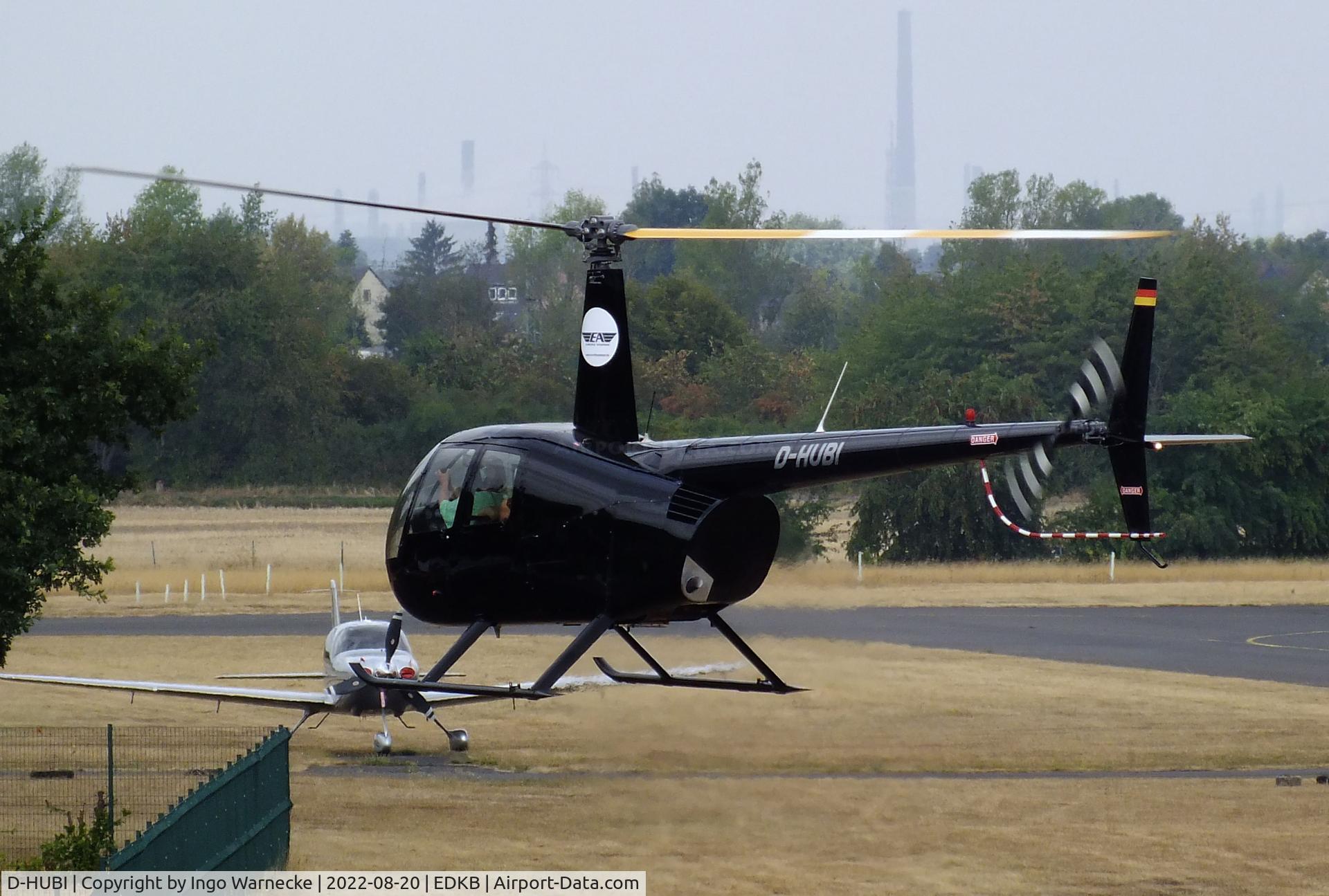 D-HUBI, 2000 Robinson R44 Astro C/N 0725, Robinson R44 Astro of EA Eurofly Aviation at Bonn-Hangelar airfield during the Grumman Fly-in 2022
