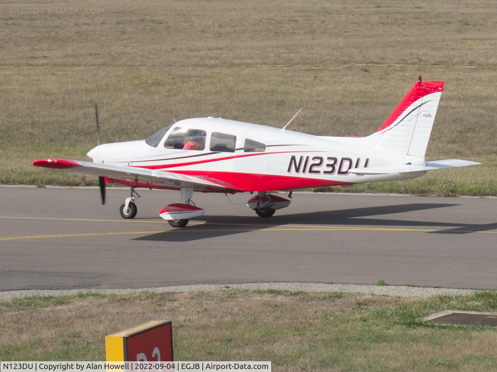 N123DU, 1977 Piper PA-28-161 Cherokee Warrior II C/N 28-7716195, Taxying for departure at Guernsey with a new paint job