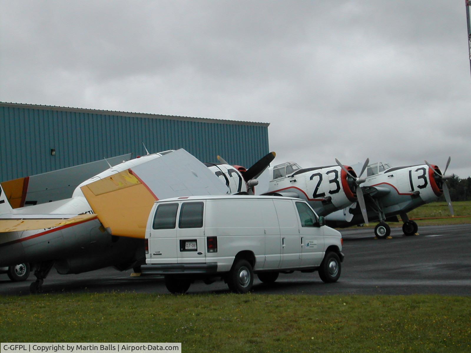 C-GFPL, 1950 Grumman TBM-3E Avenger C/N 2839, Just outside Fredericton NB 2005 or 2006, the plane C-GFPL at left with 3 others behind ( cowling of C-GFPT just behind) Forest Protection Ltd. Own work