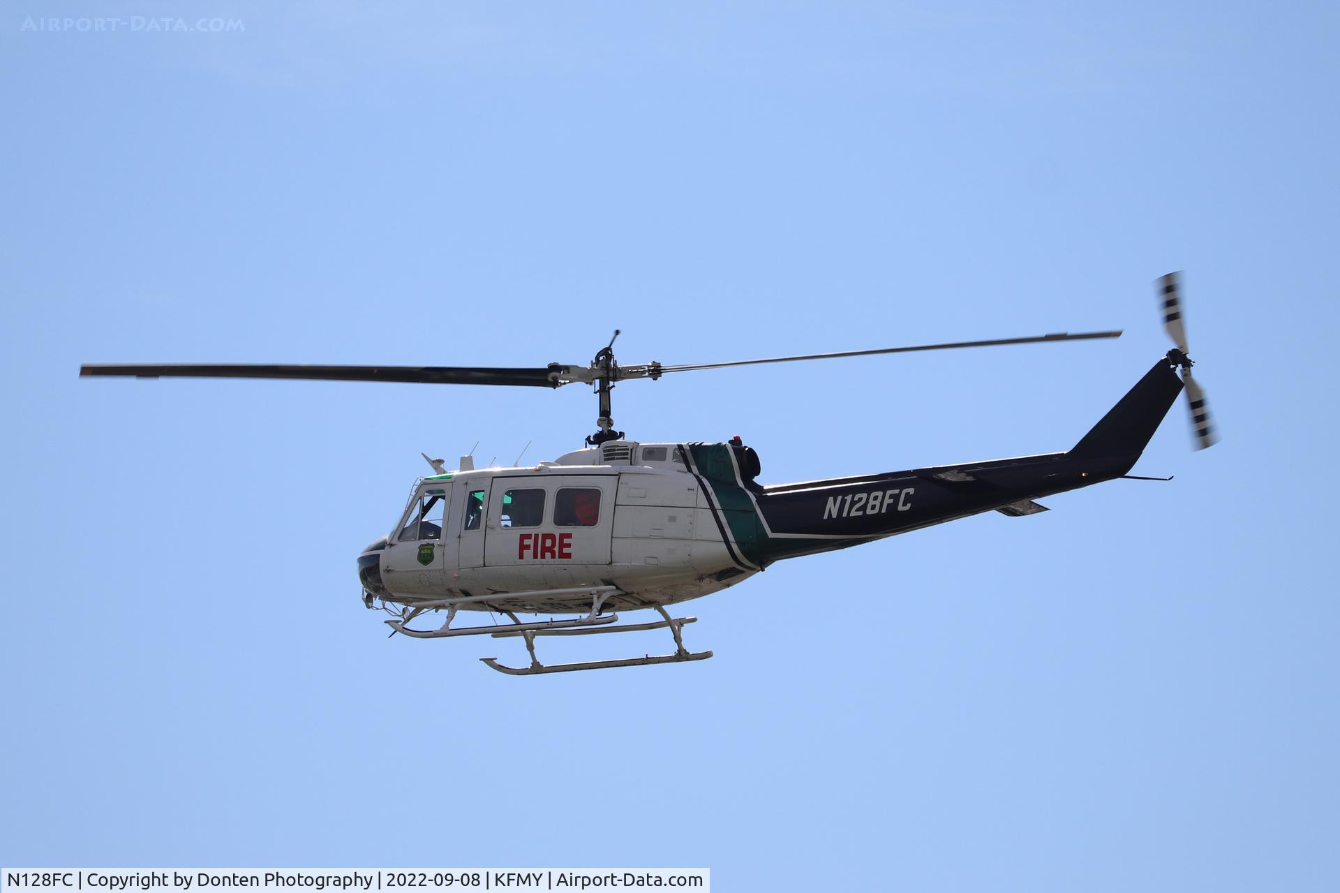 N128FC, Bell UH-1H Iroquois C/N 12136 (69-15848), Forestry 28 departs the south ramp at Page Field