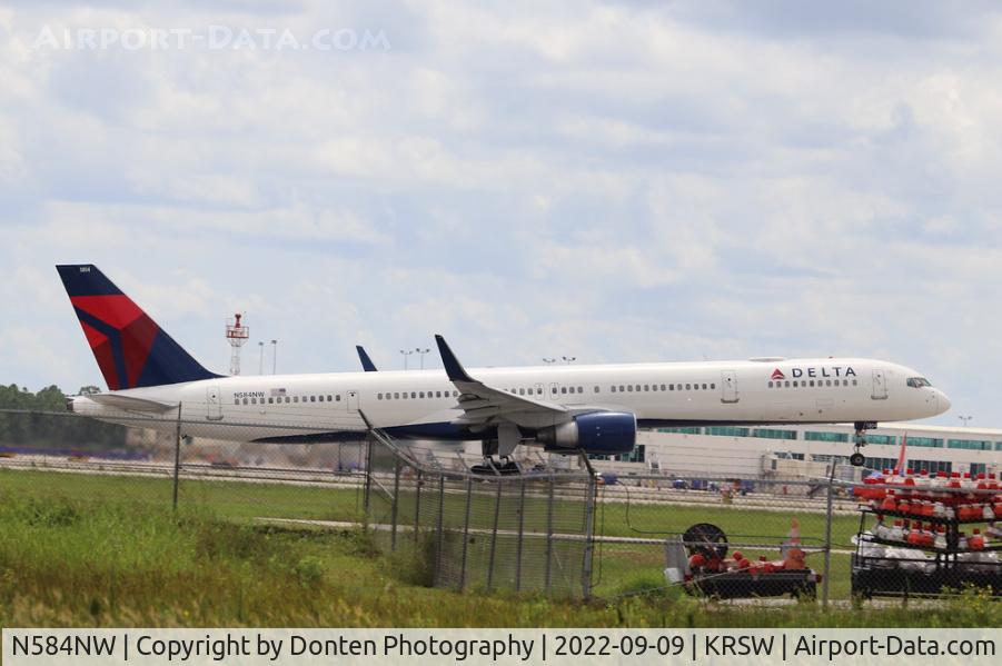 N584NW, 2002 Boeing 757-351 C/N 32984, Delta Flight 2489 departs Runway 24 at Southwest Florida International Airport enroute to Detroit Metro Airport
