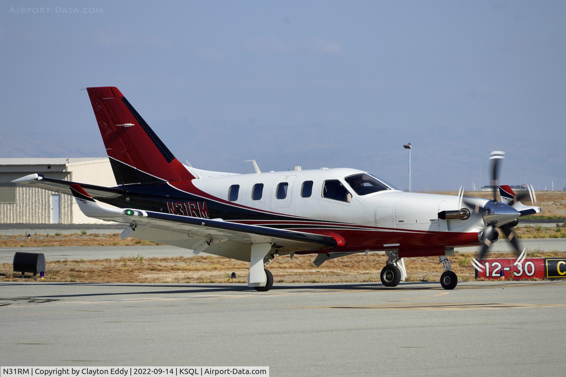 N31RM, 2015 Socata TBM 900 C/N 1078, San Carlos Airport in California.