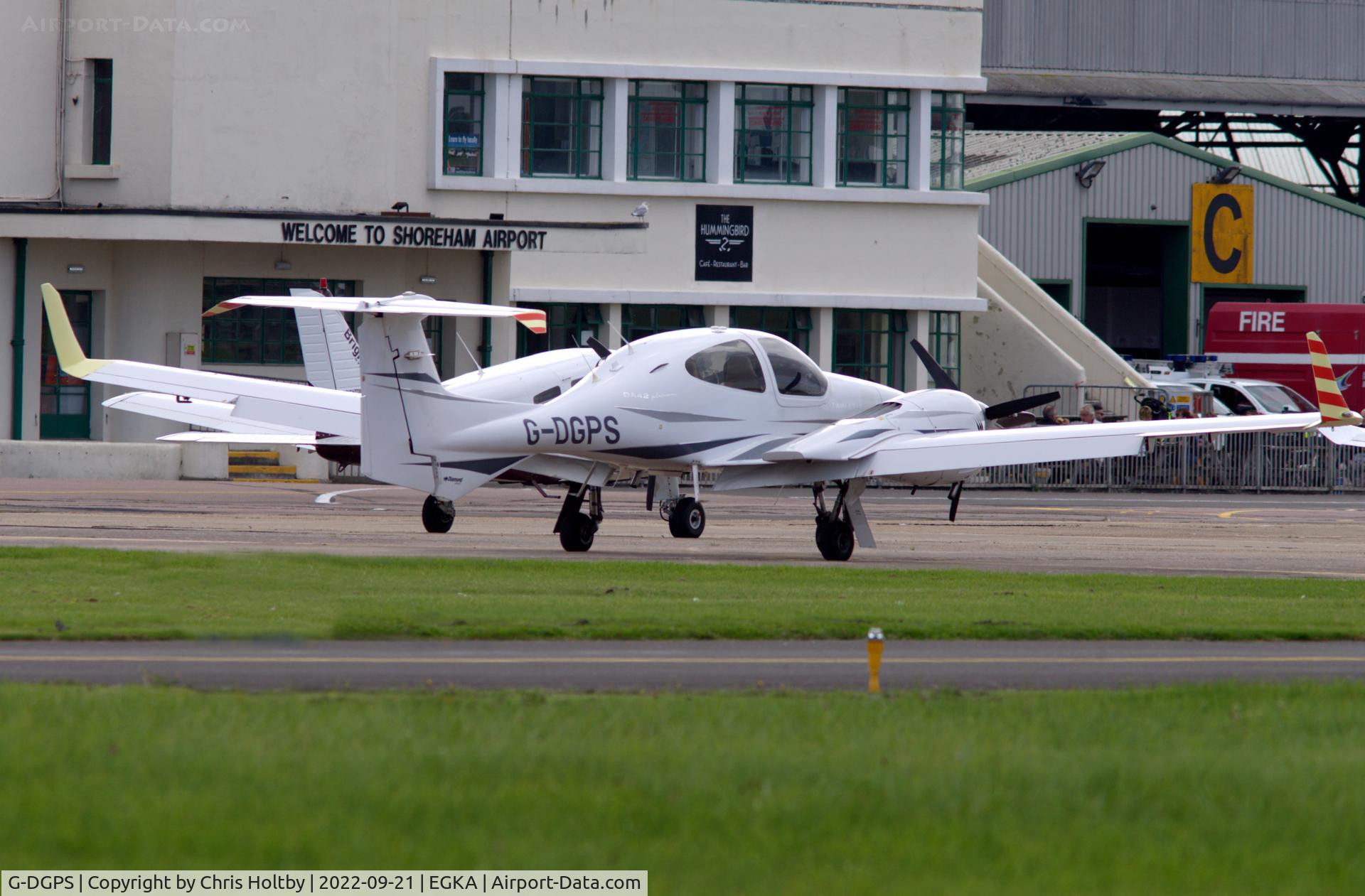 G-DGPS, 2008 Diamond DA-42 Twin Star C/N 42.355, Parked in front of the Airport Terminal building at Shoreham, Sussex