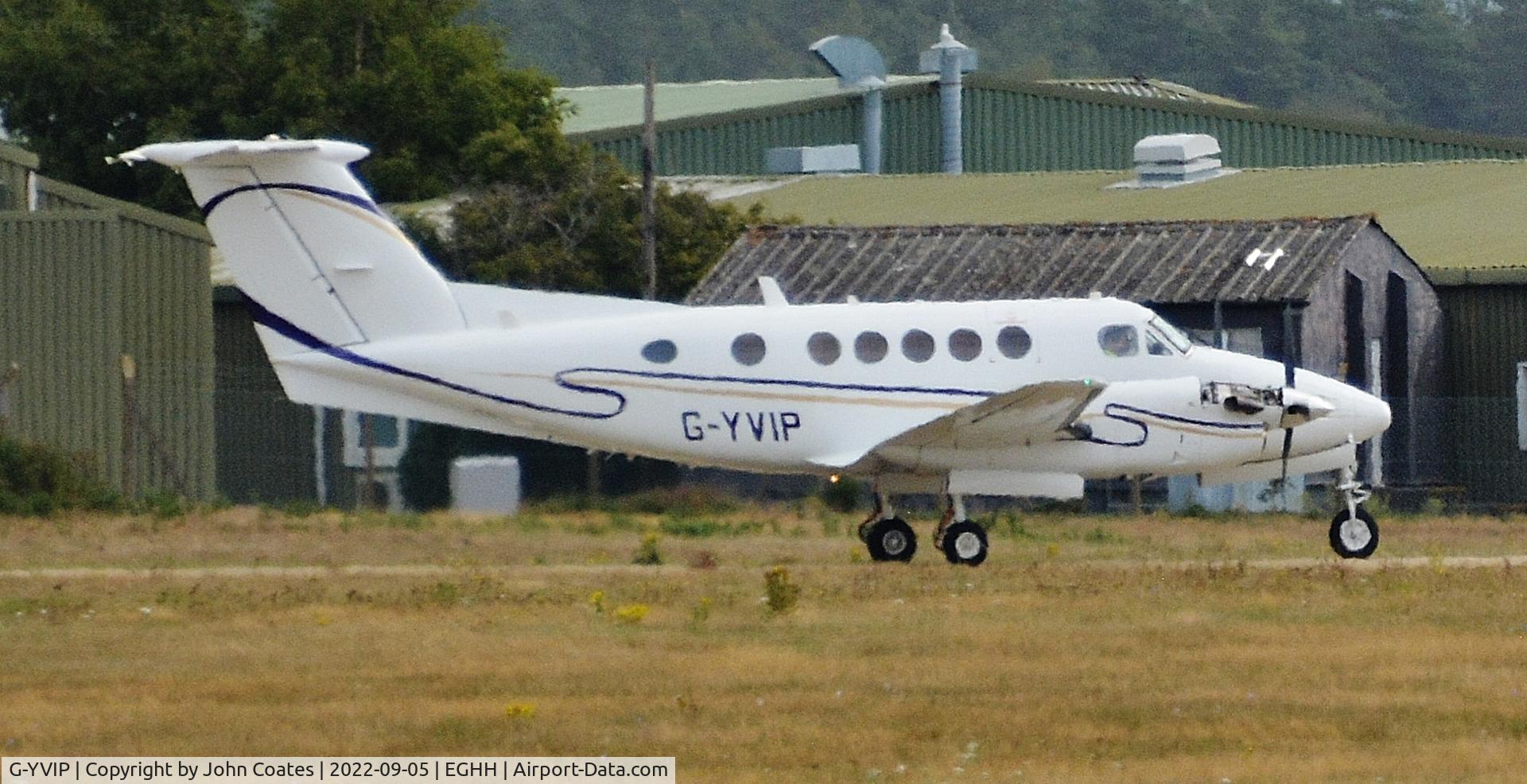 G-YVIP, 1988 Beech B200 King Air C/N BB-1306, Engine running in heat haze