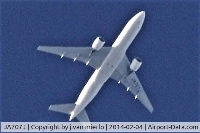 JA707J, 2004 Boeing 777-246/ER C/N 32894, Cruising over Belgium