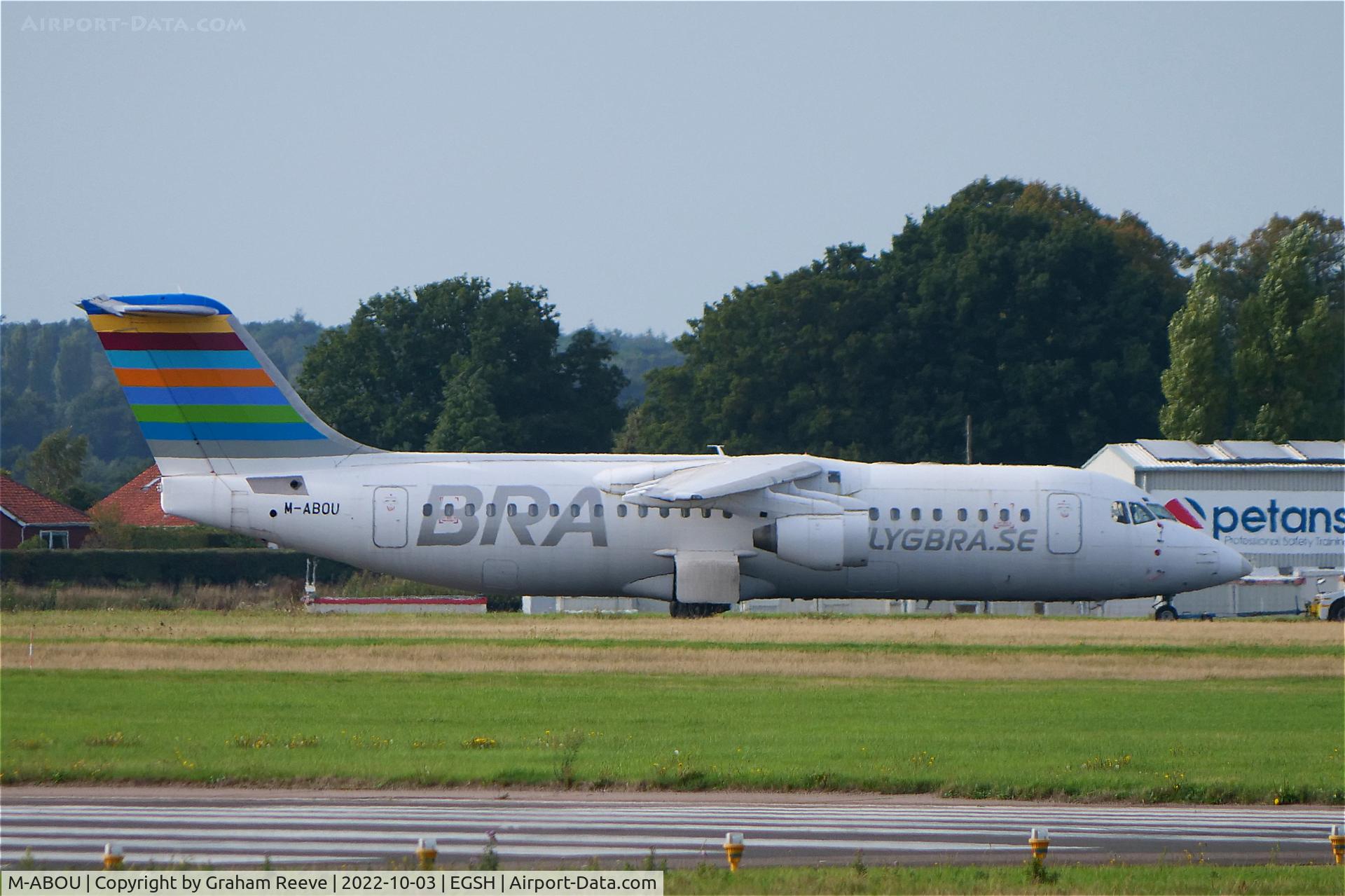M-ABOU, 1994 British Aerospace Avro 146-RJ100 C/N E3248, Under tow at Norwich.