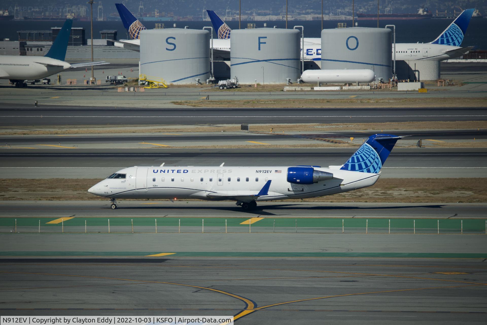 N912EV, 2002 Bombardier CRJ-200LR (CL-600-2B19) C/N 7728, SFO 2022.