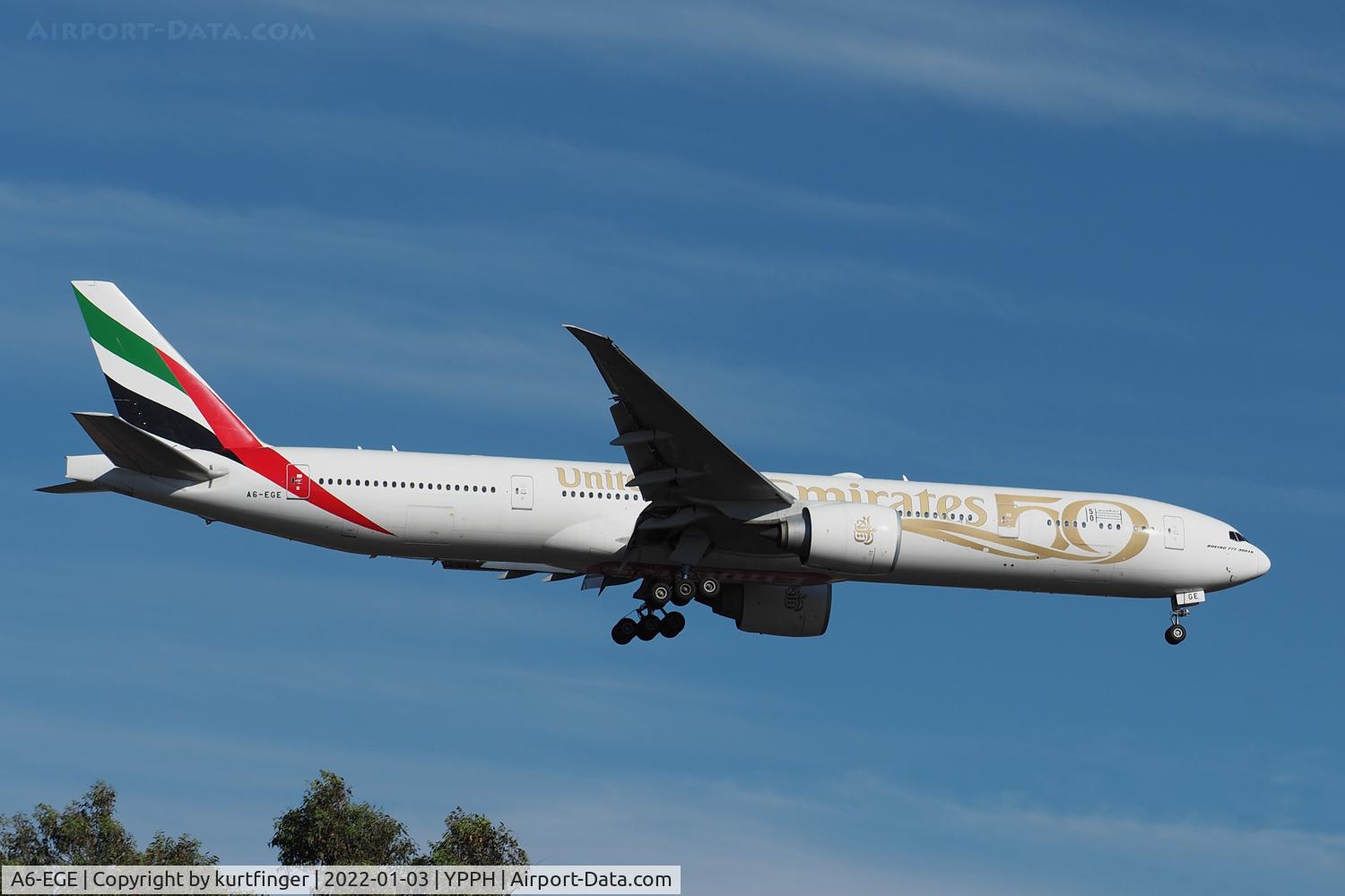 A6-EGE, 2011 Boeing 777-31H/ER C/N 35597, Boeing 777-31H_ER cn 35597 Ln 957. Emirates A6-EGE 50th year titles rwy 21 YPPH 03 January 2022