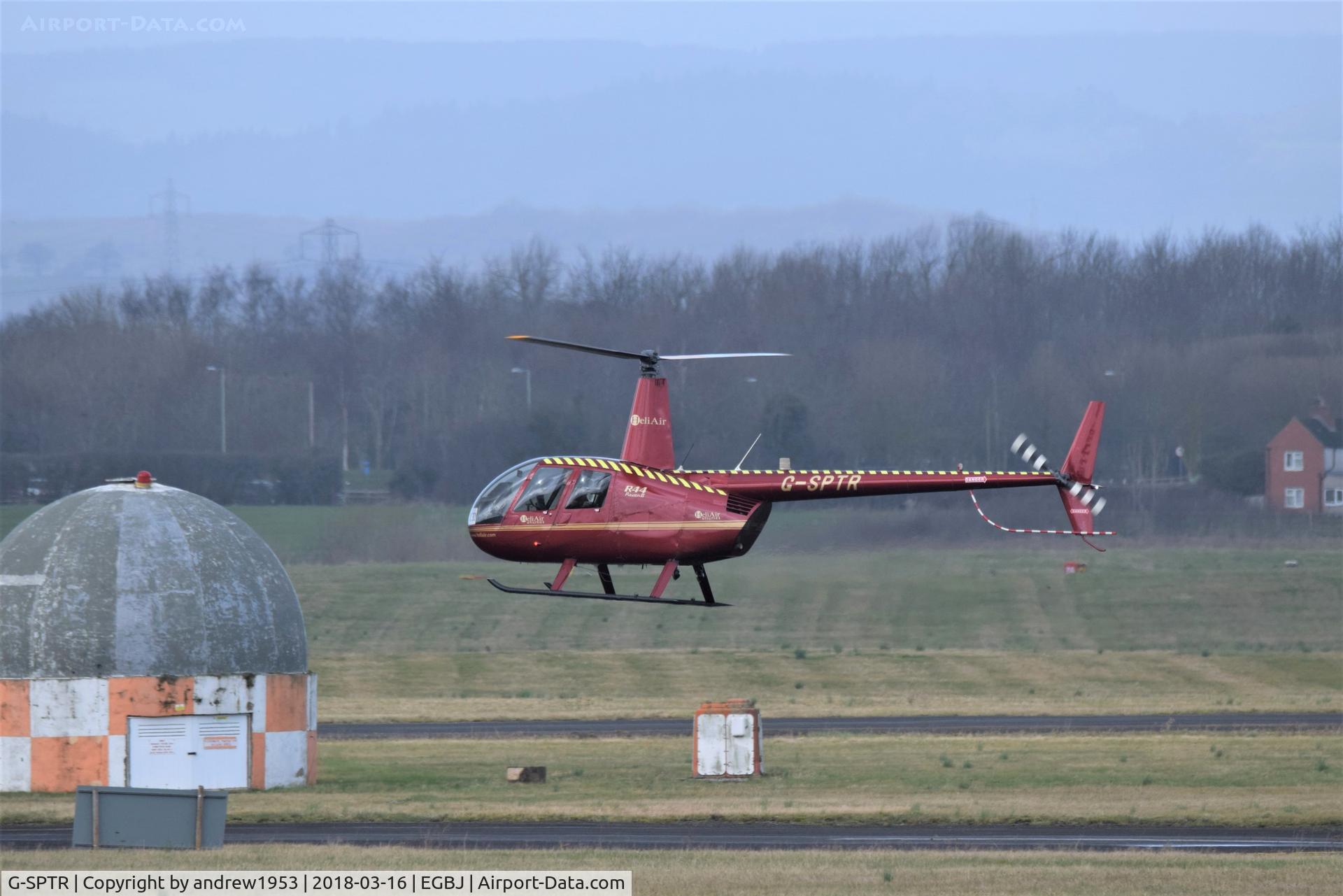 G-SPTR, 2009 Robinson R44 Raven II C/N 12799, G-SPTR at Gloucestershire Airport.