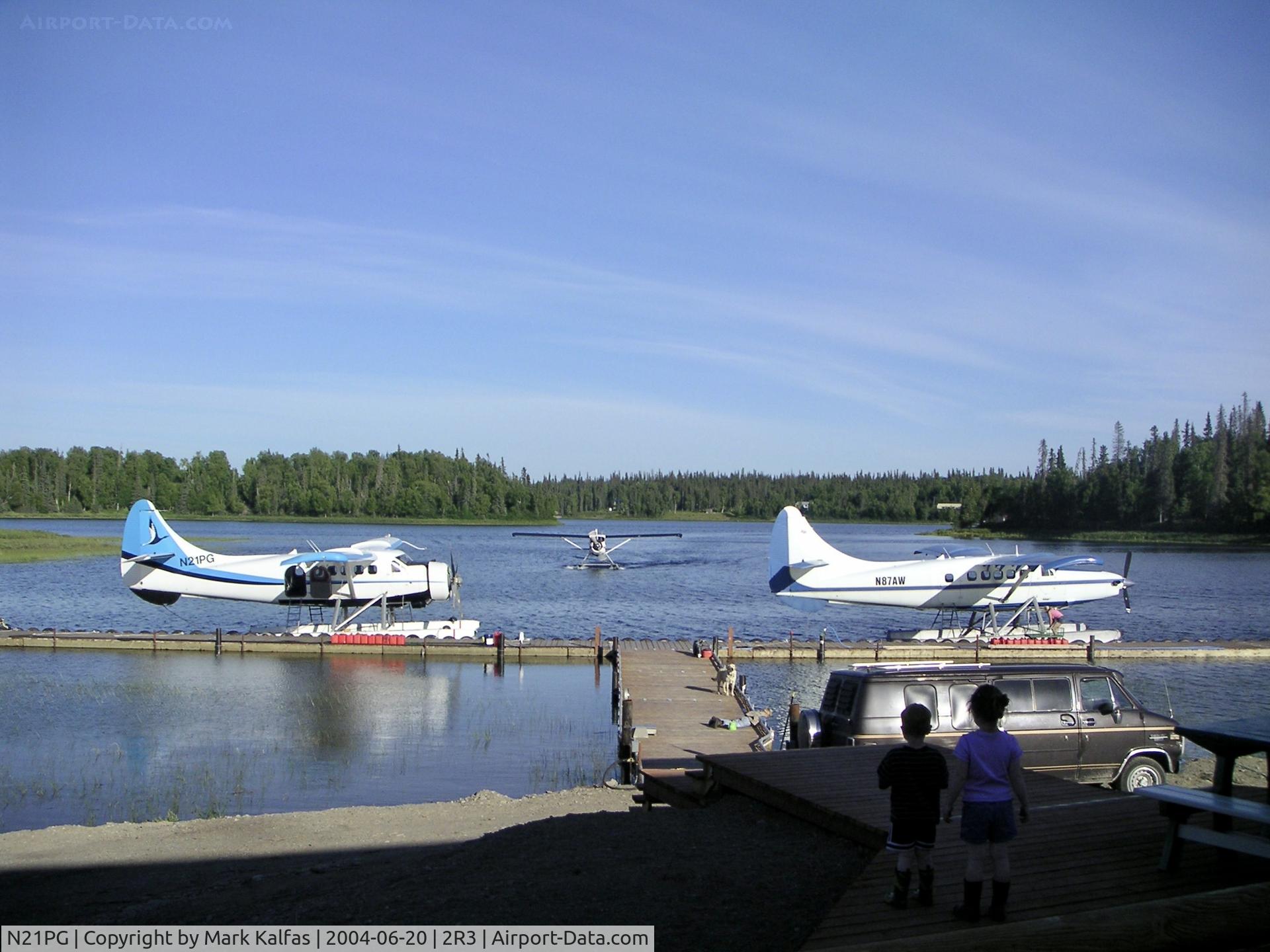 N21PG, 1958 De Havilland Canada U-1A Otter (DHC-3) C/N 310, Alaska West Air Dehavilland DHC-3, N21PG and N87AW docked at 2R3 (Island Lake-Kenai, AK).
