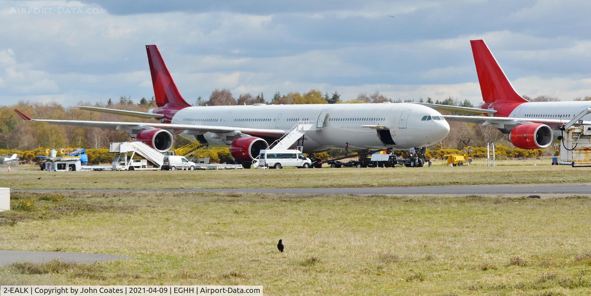 2-EALK, 2006 Airbus A340-642 C/N 768, At Cargo parking ex G-VRED to become G-ECLC