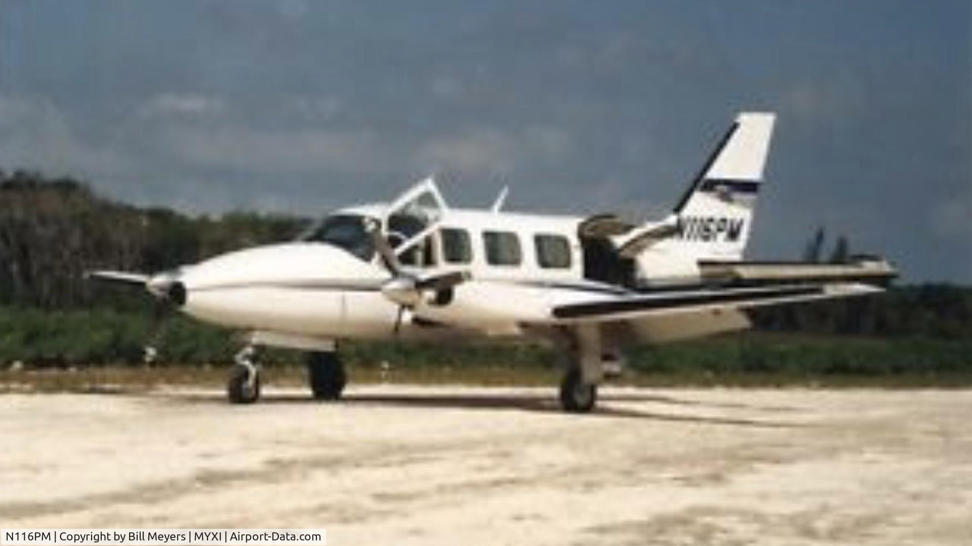 N116PM, Piper PA-31-350 Chieftain C/N 31-8052127, N116PM on the ground at Scotland Cay Bahamas circa 1994