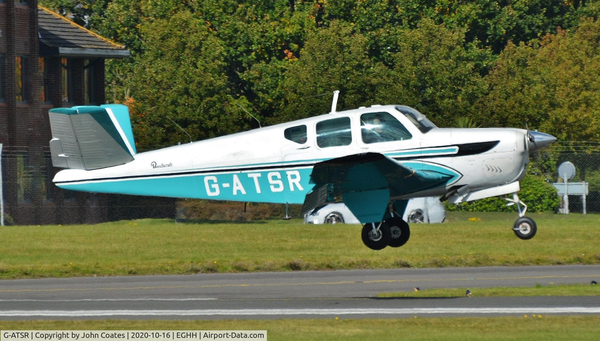 G-ATSR, 1959 Beech M35 Bonanza C/N D-6236, About to touchdown on 08