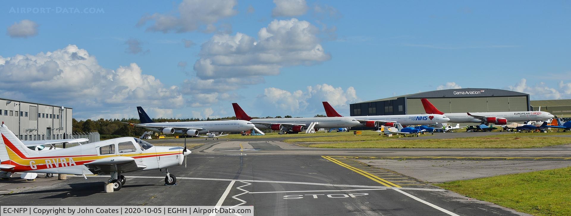 EC-NFP, 2008 Airbus A340-642X C/N 933, At Cargo parking with the fleet 9H-PPE, 9H-NHS and 2-EALK