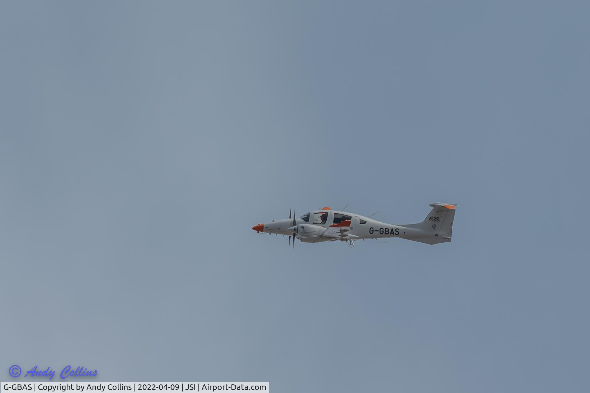 G-GBAS, 2016 Diamond DA-62 C/N 62.019, I think he was checking the PAPI as he did several approaches.