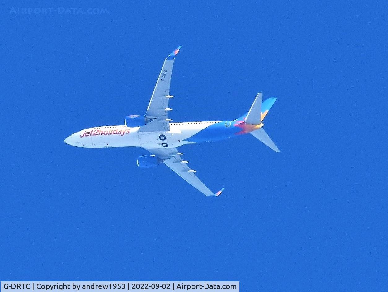 G-DRTC, 2006 Boeing 737-808 C/N 34702, G-DRTC over the Bristol Channel.