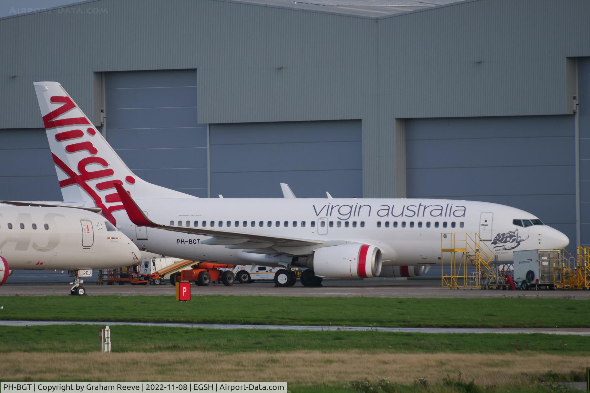 PH-BGT, 2011 Boeing 737-7K2 C/N 38634, Partially obscured whilst parked at Norwich.