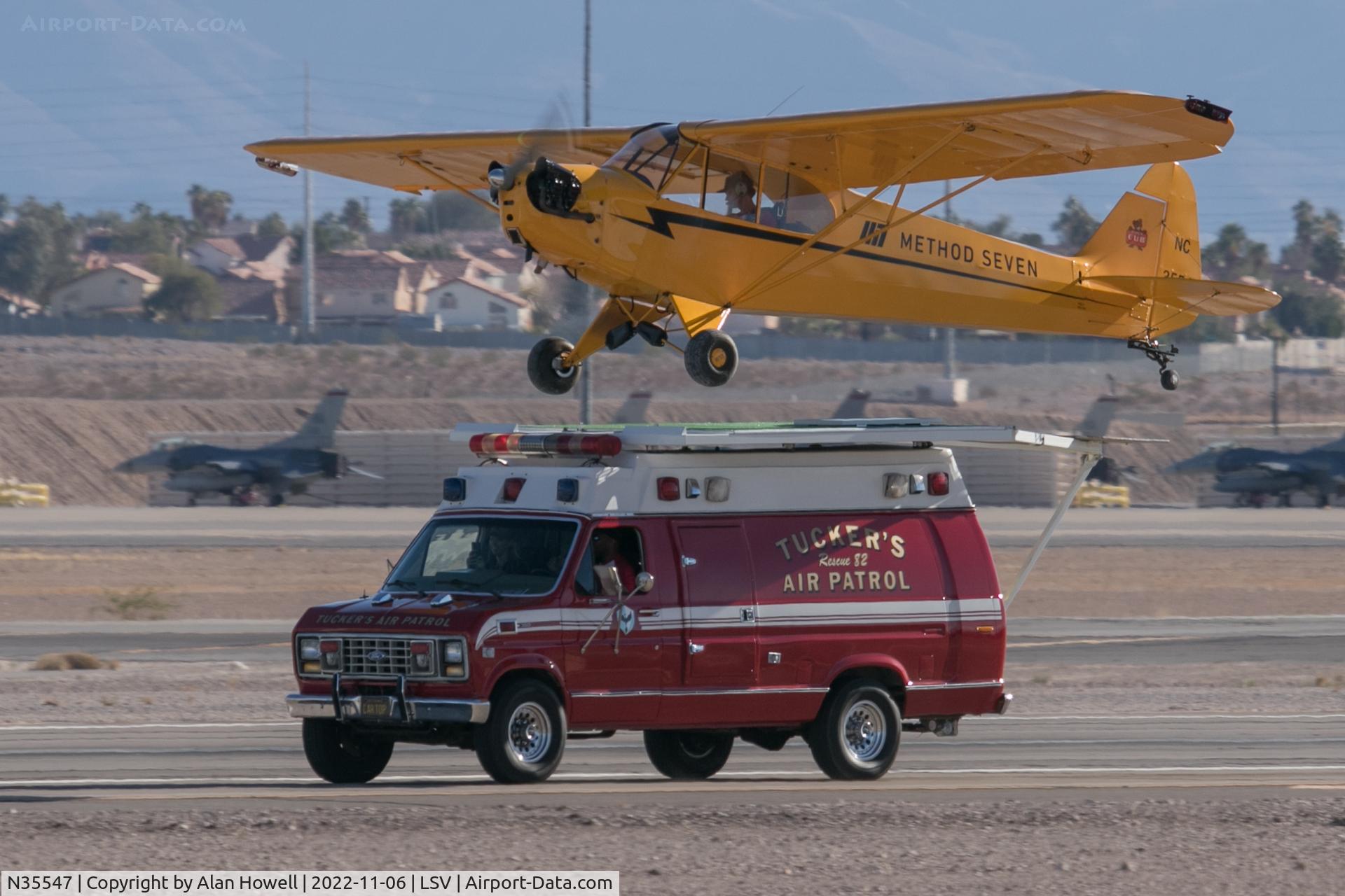 N35547, 1941 Piper J3C-65 Cub C/N 6452, Taking off from the support vehicle at Aviation Nation 2022 (having landed on it earlier)