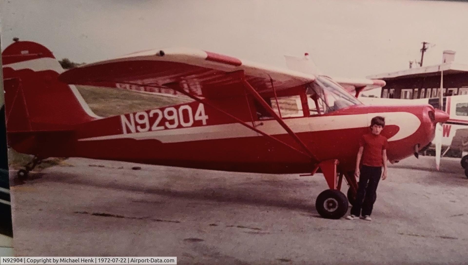 N92904, 1946 Commonwealth 185 Skyranger C/N 1635, Circa 1972.  Owned by Bob Henk, flown out of Kunstman Field in Ray, MI. Grass field, single N-S strip. Wires at north end, tall trees at the south end. Flown on skis in the wintertime.