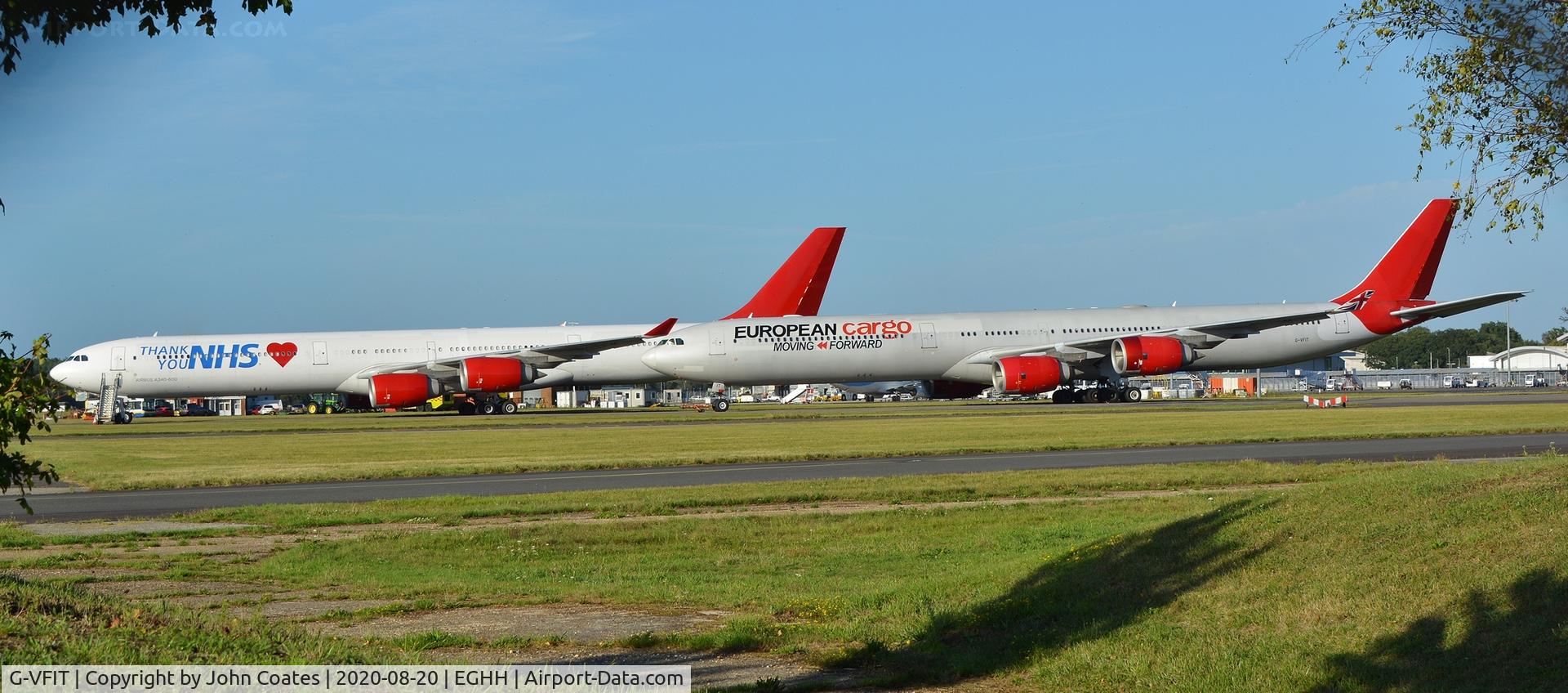G-VFIT, 2006 Airbus A340-642 C/N 753, Parked with 9H-EAL
