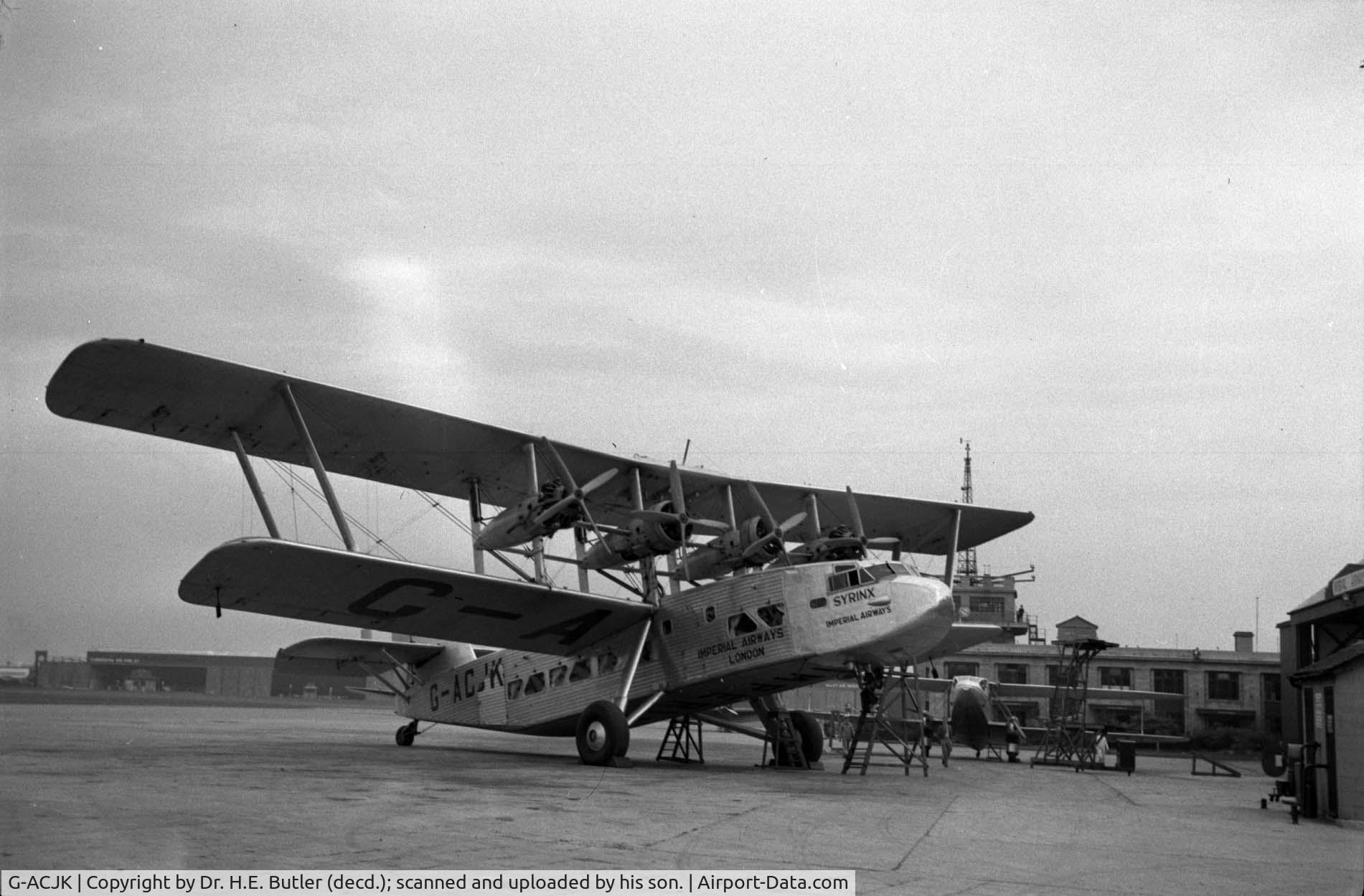 G-ACJK, 1935 Short L.17 Scylla C/N S.769, Imperial Airways Syrinx, Croydon Aerodrome, 2nd twin-engine biplane present but not identified. Image scanned directly from monochrome negative with minimal cropping and slight contrast enhancement.
