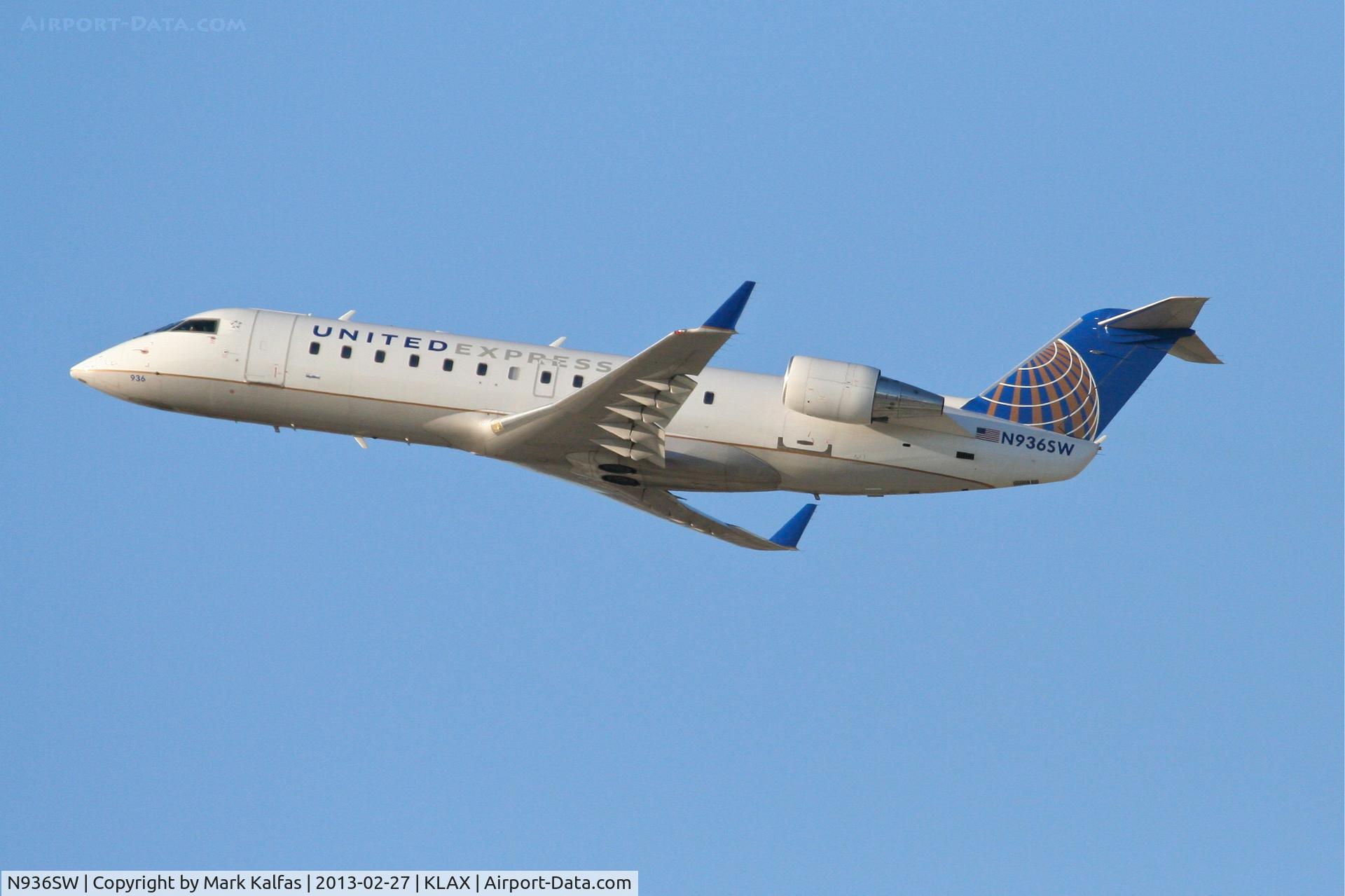 N936SW, 2002 Bombardier CRJ-200LR (CL-600-2B19) C/N 7726, SkyWest CRJ2, N936SW departing 25R LAX