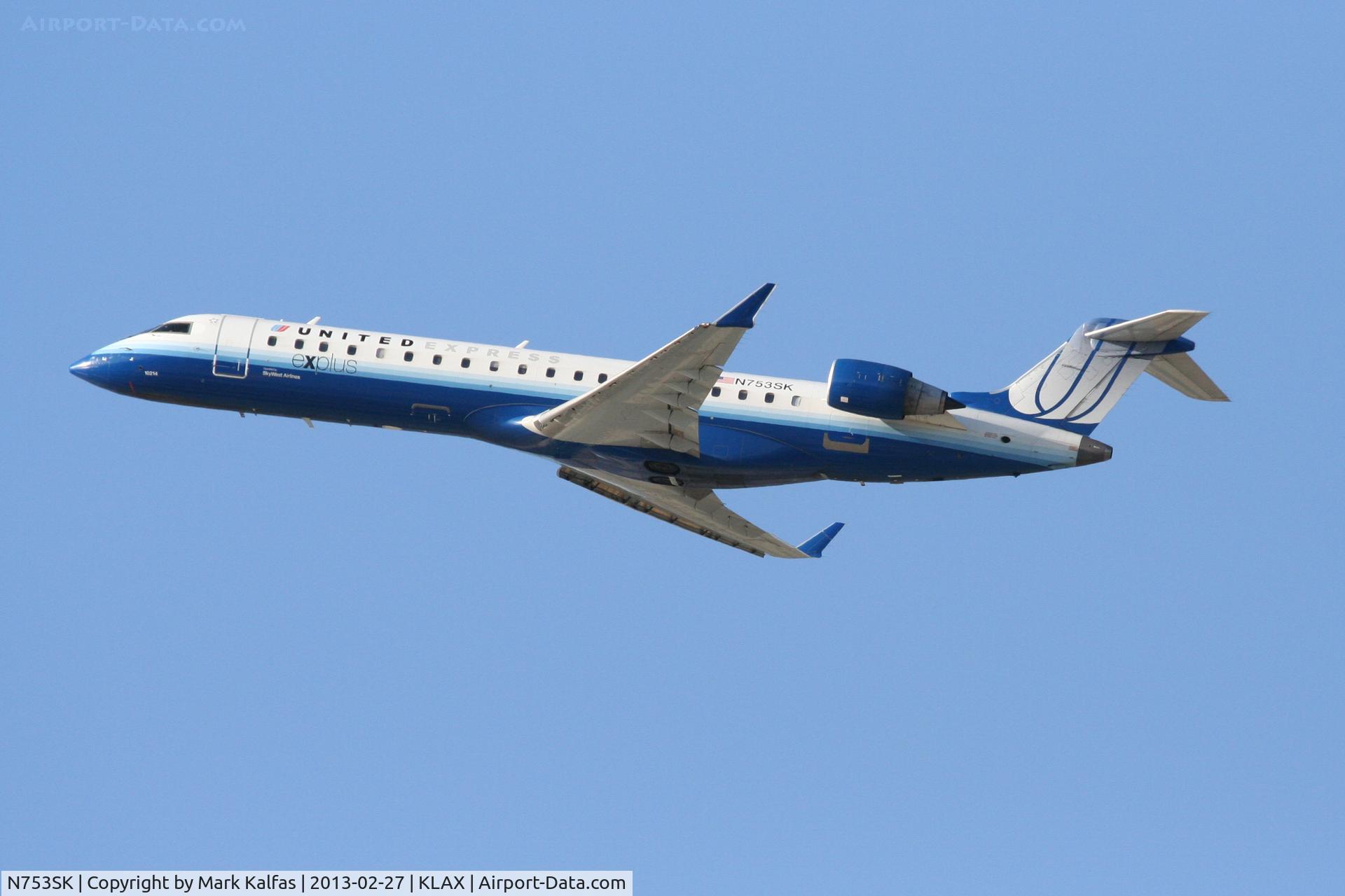 N753SK, 2005 Bombardier CRJ-701ER (CL-600-2C10) Regional Jet C/N 10214, SkyWest/United CRJ7, N753SK departing 25R KLAX